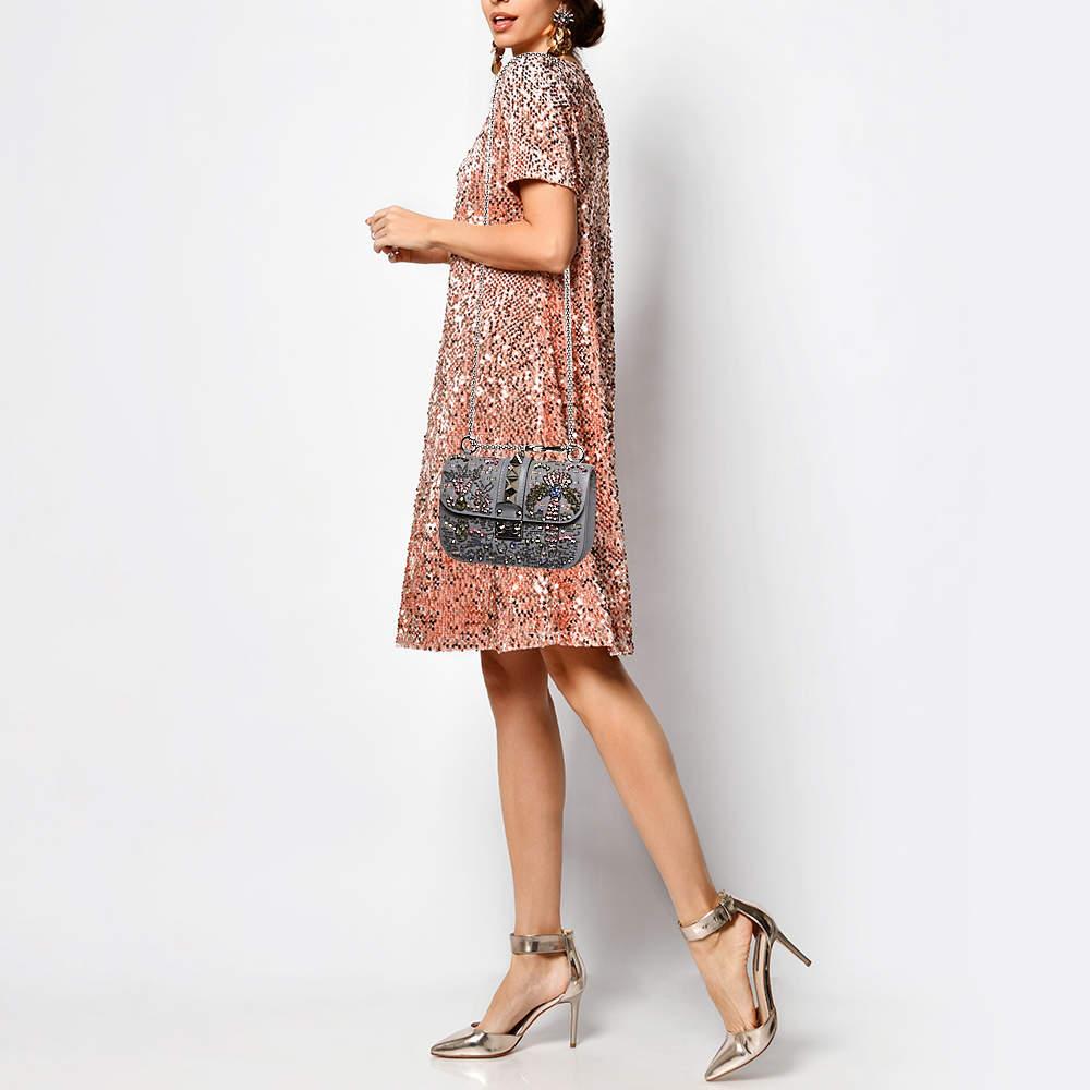 Flap bags like this one will never go out of style and bring immense elegance. It features a well designed exterior and the front flap opens to an interior with enough space to keep your daily essentials.
