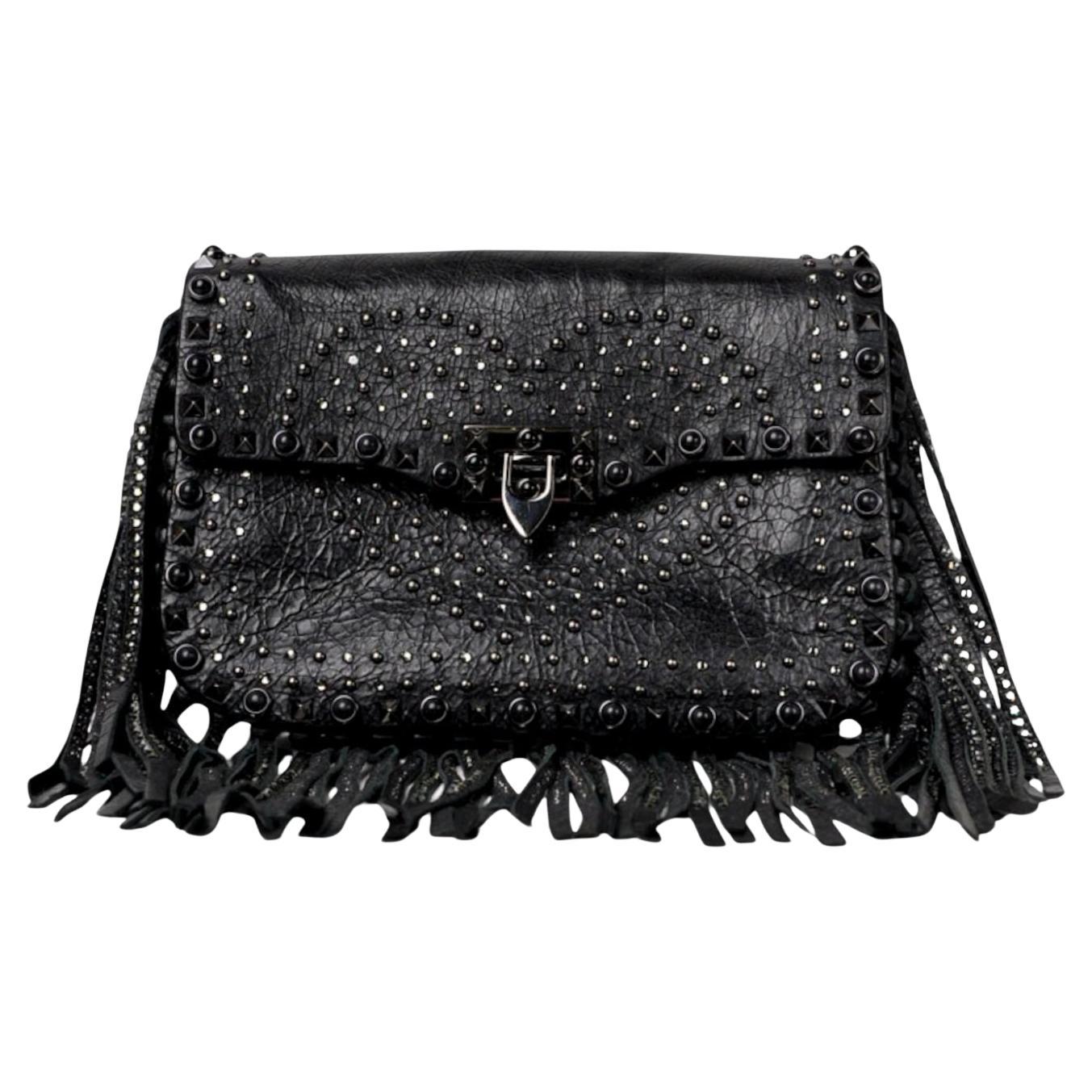 Valentino Guitar Rockstud Flecos Pequeños Negro en venta