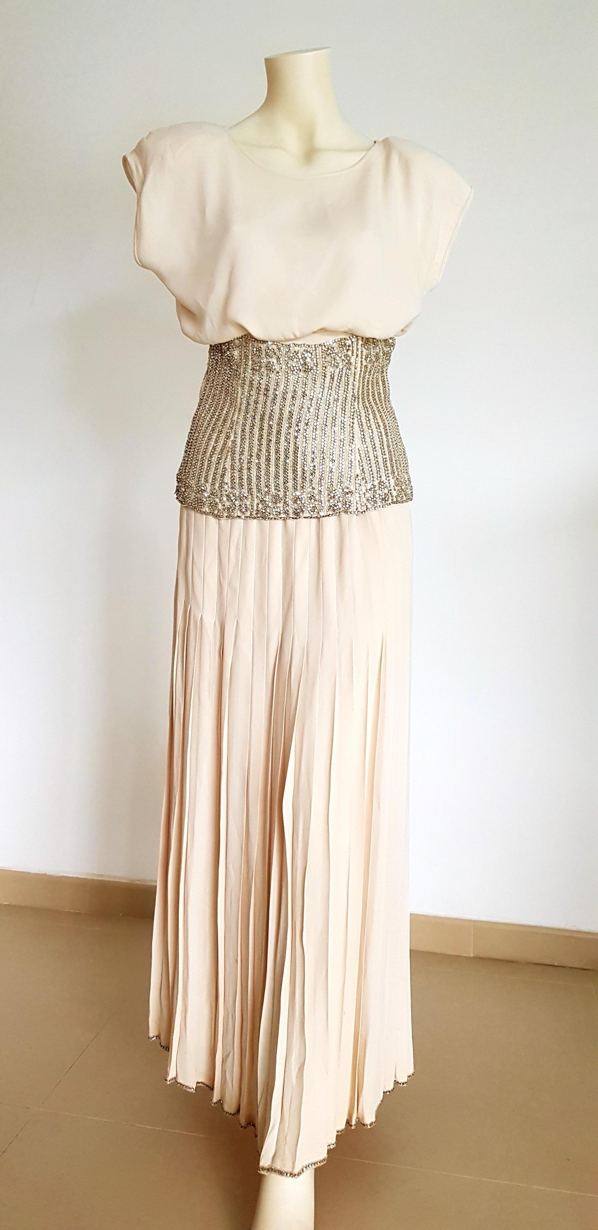 VALENTINO Haute Couture silk top and skirt, swarovski diamonds band combined with the top, evening dress - Unworn.
..
SIZE: equivalent to about Small / Medium, please review approx measurements as follows in cm. 
TOP: lenght 60 with the band, chest