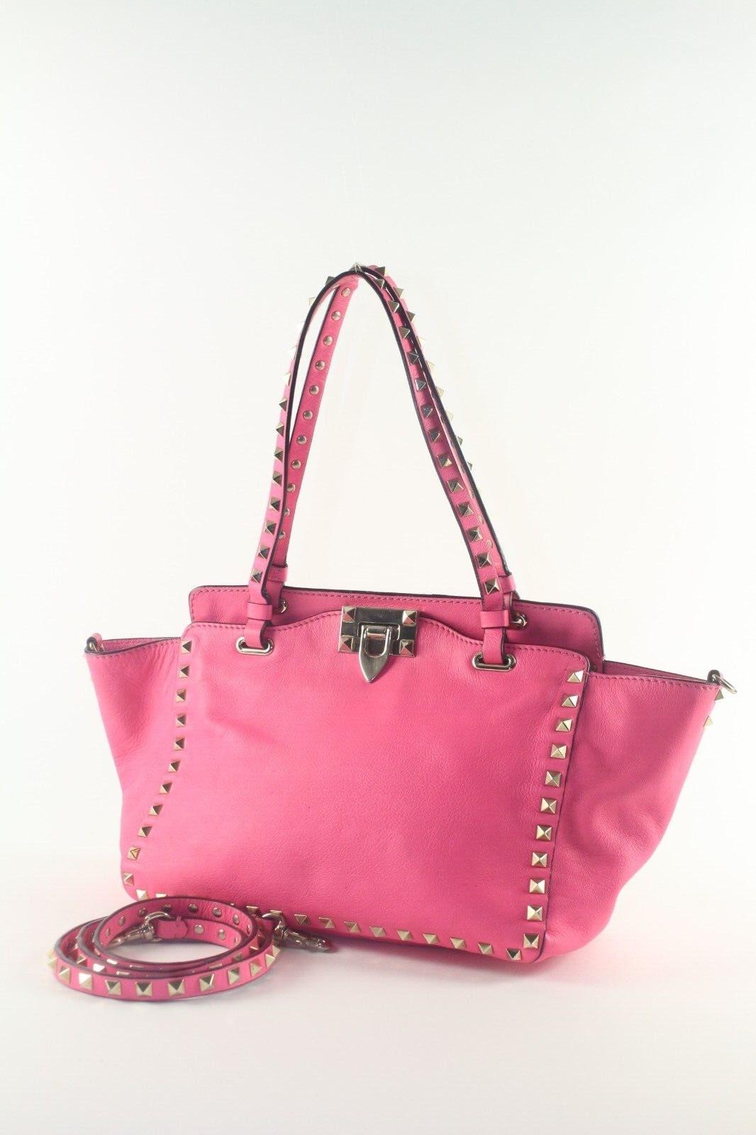 Valentino Hot Pink Rockstud 2way Tote Small 1VAL1129K
Date Code/Serial Number: BSG03BOL1

Made In: Italy

Measurements: Length:  15.5 