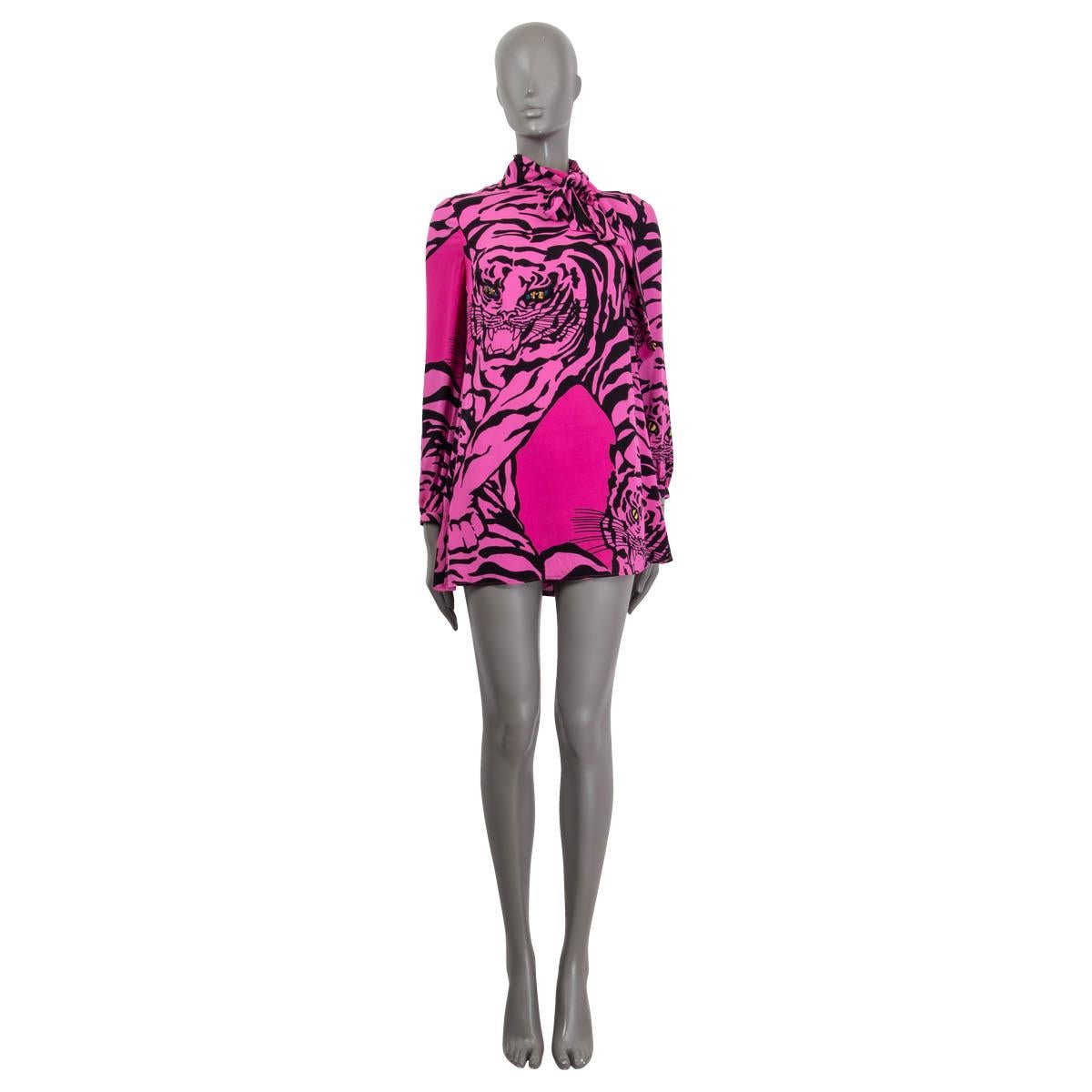 100% authentic Valentino long-sleeve tiger-print dress in pink and black silk (100%) with a mock-neck and self-tie bow. Closes on the back with concealed zipper and buttons on the cuffs. Lined in (91%) silk and elastane (9%). Embroidery thread in
