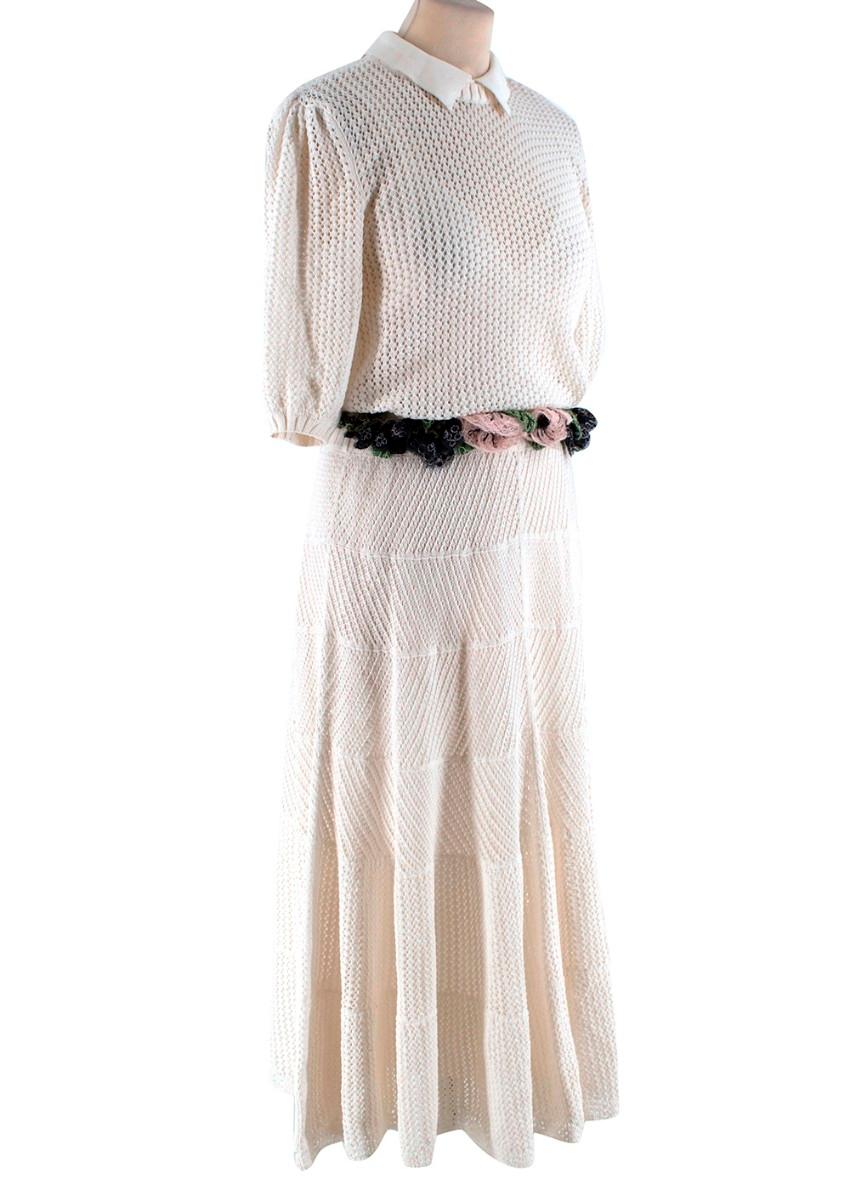 Valentino Ivory Crochet Knitted Dress with Belt

- Crochet-knit 
- Midi length
- Chelsea collar 
- Embroidered detachable belt with floral appliques
- Puffed short sleeves
- Elasticated waistband 
- Button-fastening keyhole at back
- Ribbed trims
-