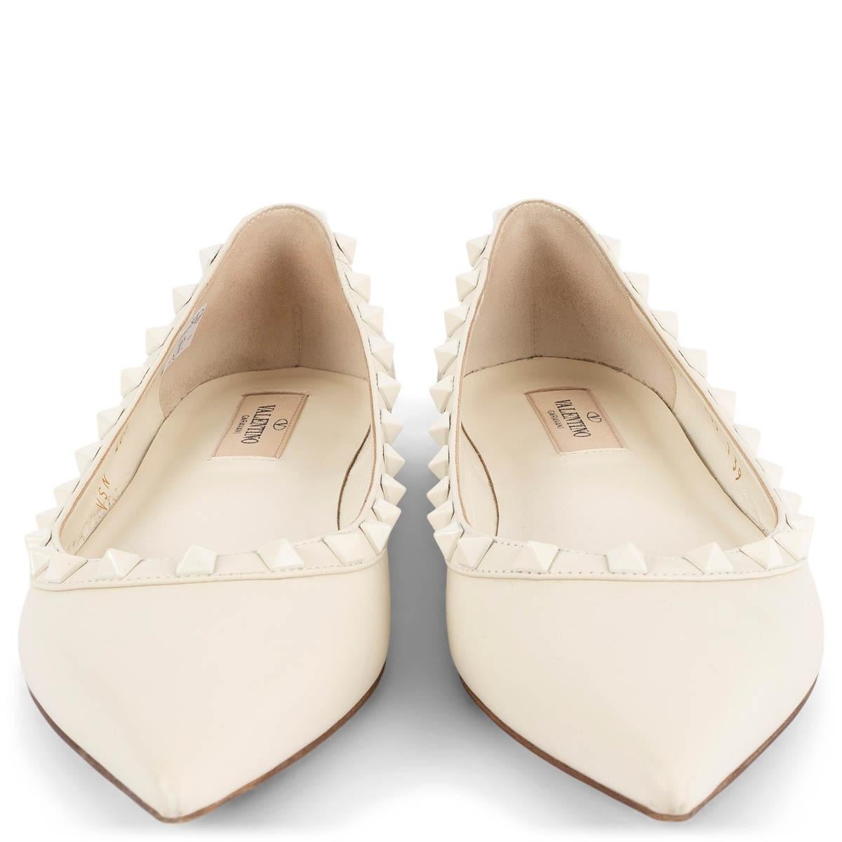 100% authentic Valentino Rockstud pointed-toe flats in ivory leather embellished with tonal signature studs. Have been worn and are in excellent condition.

Measurements
Imprinted Size	39
Shoe Size	39
Inside Sole	26cm (10.1in)
Width	8cm (3.1in)

All