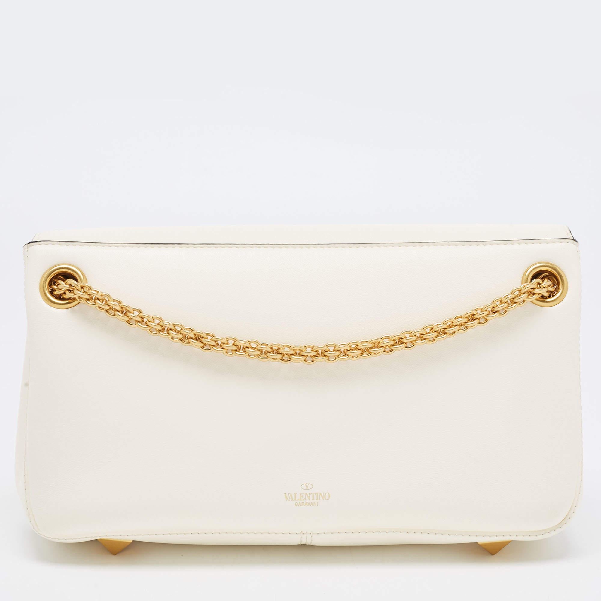 The Valentino handbag is a luxurious accessory crafted with precision. Made from high-quality materials, it features a timeless design with meticulous stitching, signature details, and gold-tone hardware.

Includes: Original Dustbag, Info Booklet,