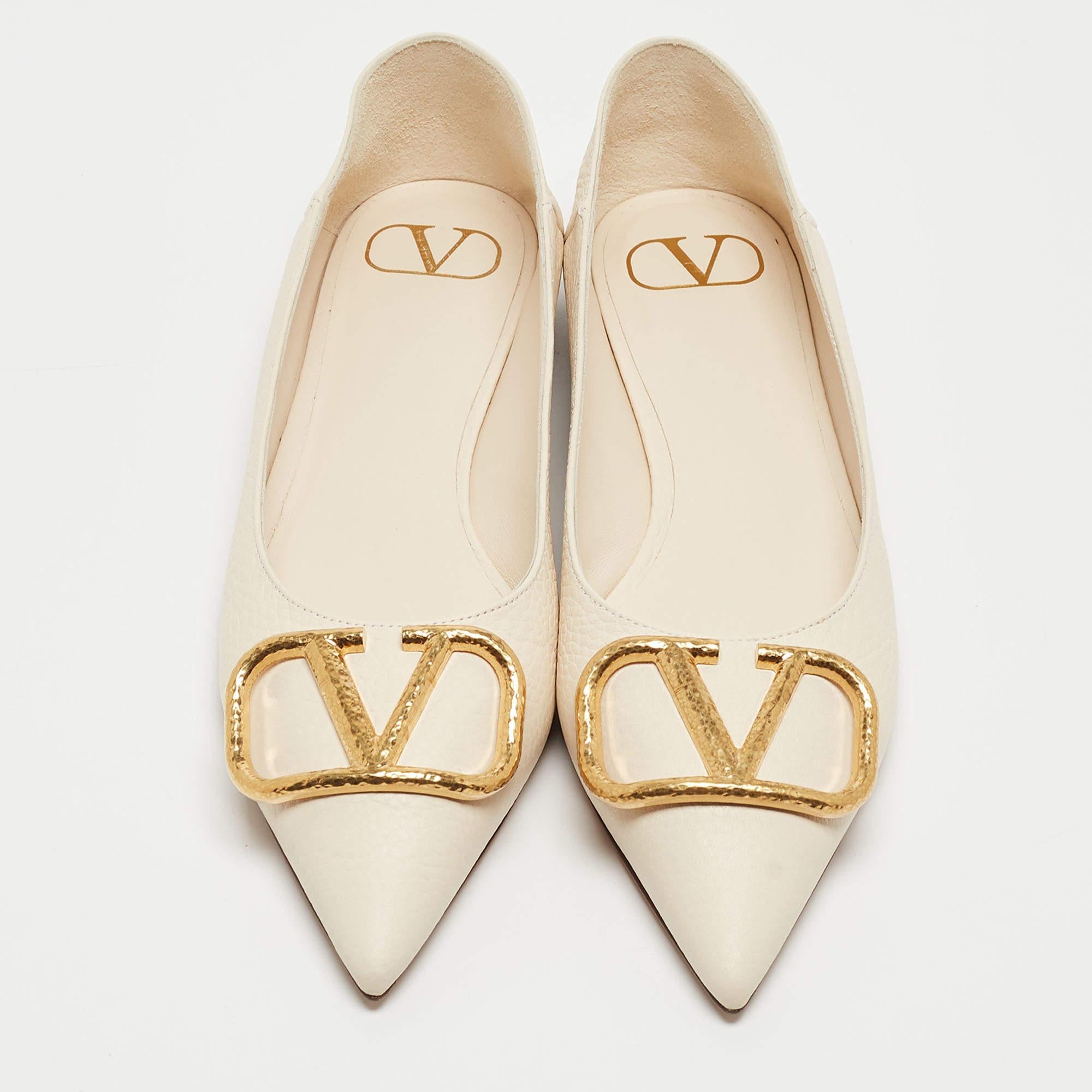 Complete your look by adding these Valentino VLogo ballet flats to your lovely wardrobe. They are crafted skilfully to grant the perfect fit and style.

Includes: Original Box, Info Booklet

