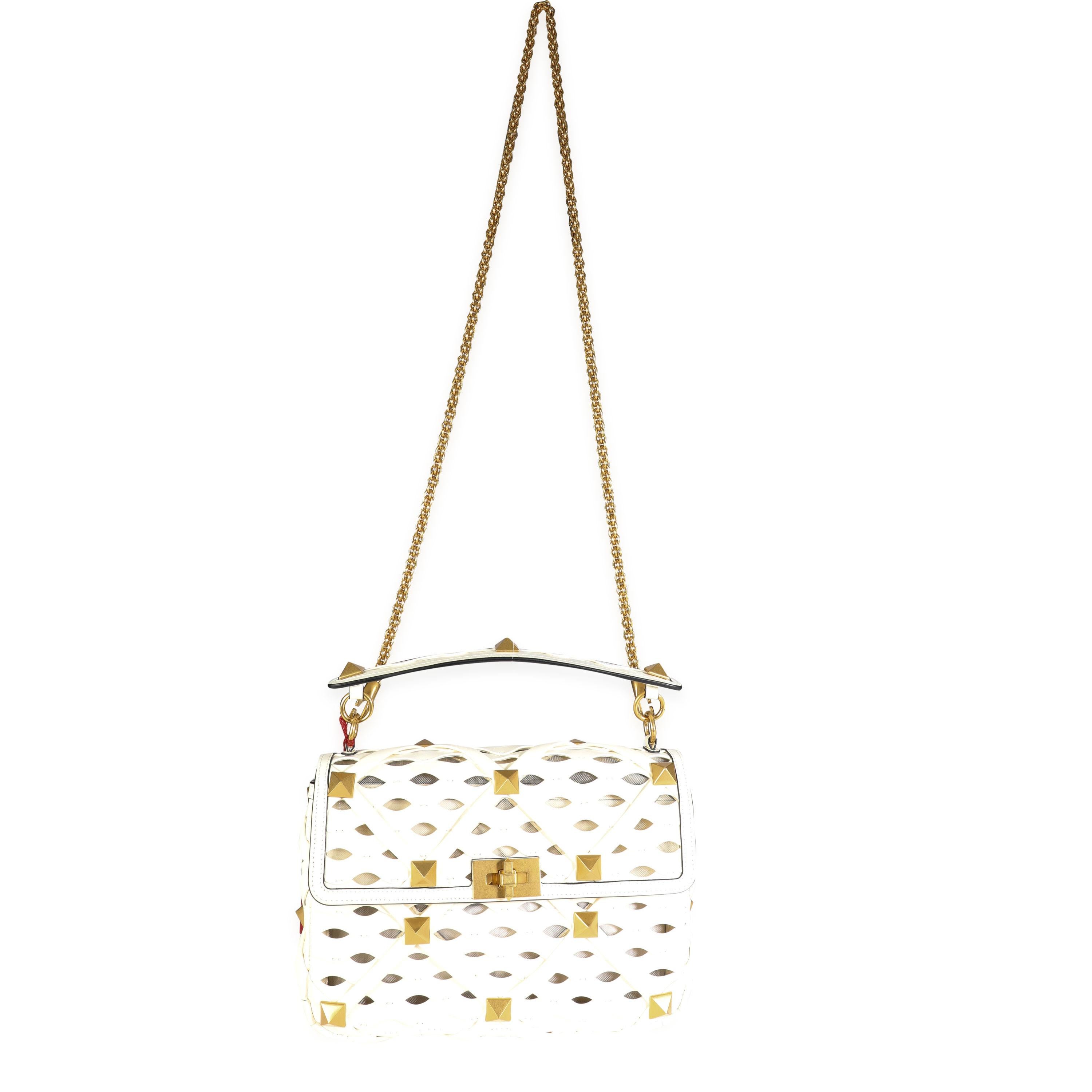 Listing Title: Valentino Ivory Nappa Leather Large Roman Stud Shoulder Bag
SKU: 117641
MSRP: 4750.00
Condition: Pre-owned (3000)
Handbag Condition: Excellent
Condition Comments: Excellent Condition. Plastic on some hardware. Faint scuffing to