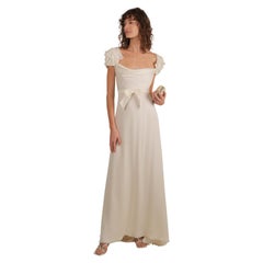 Valentino ivory peekaboo lace bust ruffle sleeve bow train wedding gown dress 