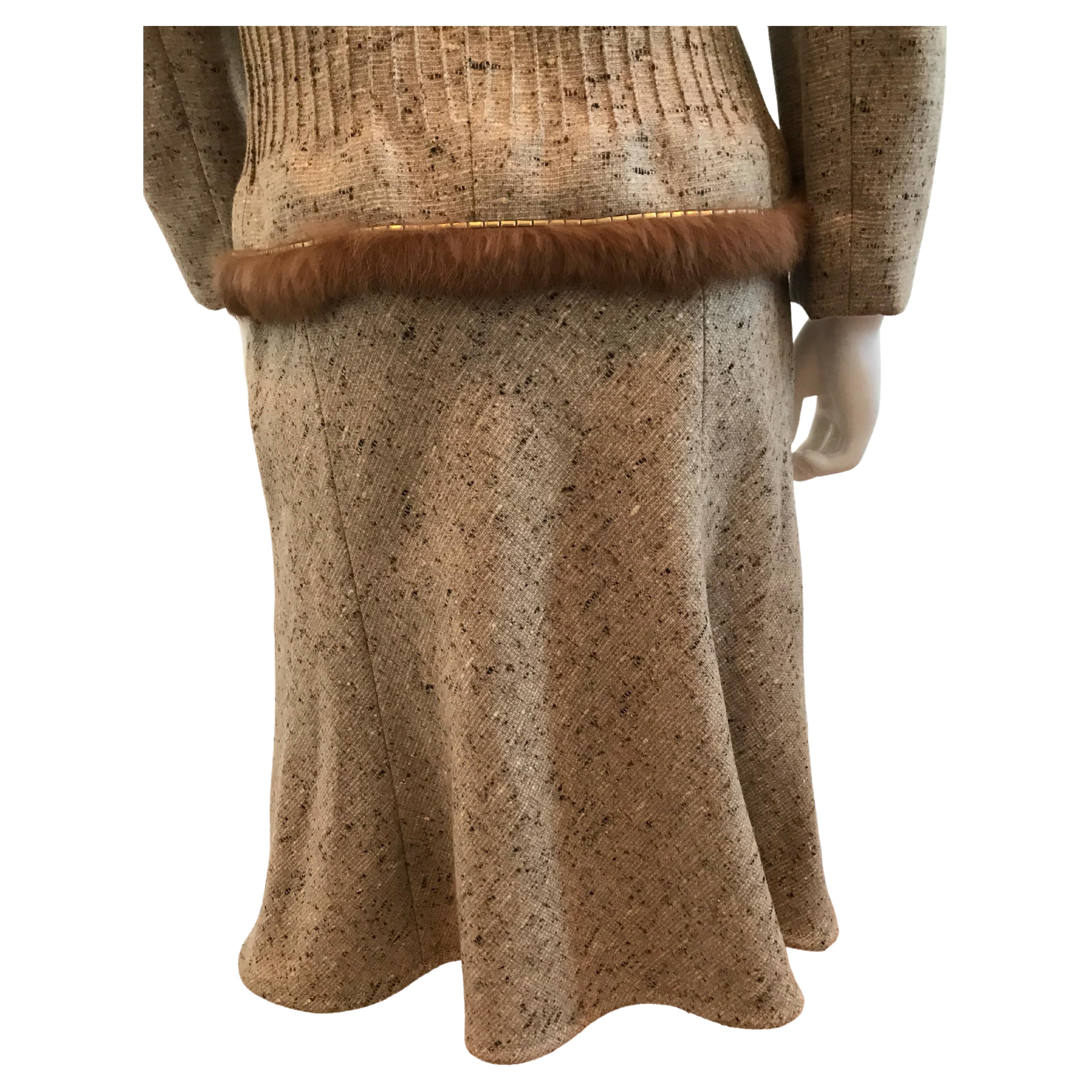 Valentino Jacket & Skirt Set with Fur Trim Size 8
Made in Italy
Silk Lining

Please be mindful that this piece has led a previous life, and may tell its story through minor imperfection. Purchasing this item continues its narrative, so you can be