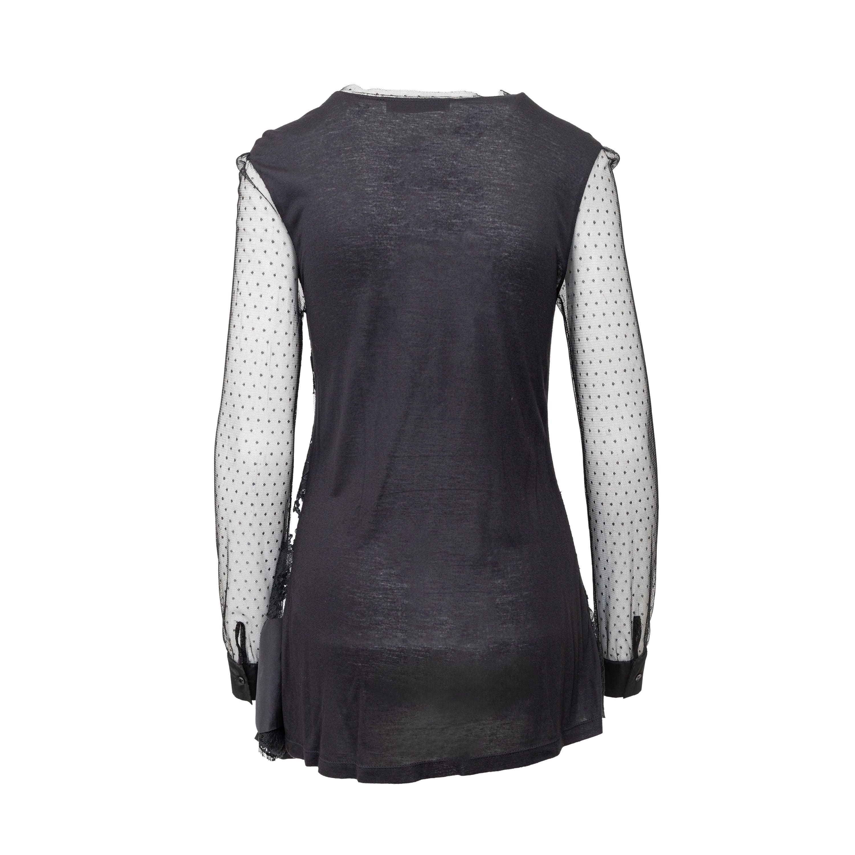 Expertly crafted by Valentino, this T-shirt couture long top exudes elegance with its delicate lace embroidery and sheer long sleeves. The silk bow accent at the hem adds a touch of femininity to this versatile black