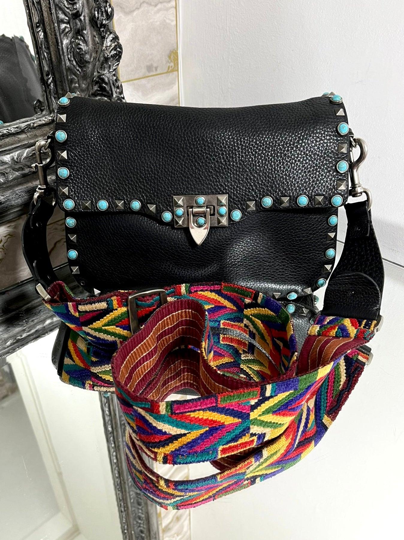 Valentino Leather Guitar Rockstud Bag

Black soft leather, crossbody bag with turquoise beading and the signature

rockstuds. Multicoloured embroidered guitar style, removable should strap.

Rrp approx £2,700.

Size - Height 19cm, Width 26cm, Depth