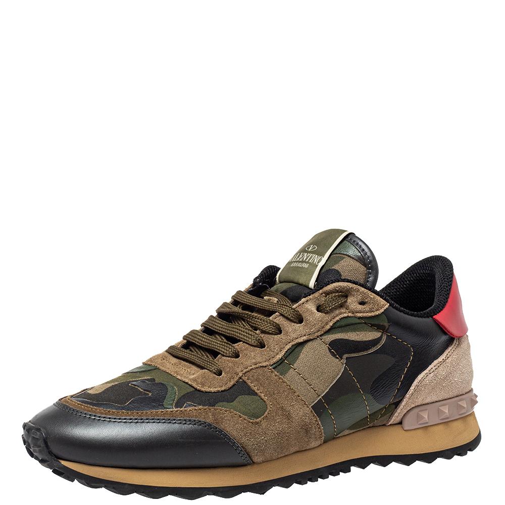 Spend your days away in high comfort with these camouflage Rockrunner sneakers from Valentino! They've been wonderfully crafted from a combination of leather as well as suede and designed with signature pyramid studs on the counters, laces on the
