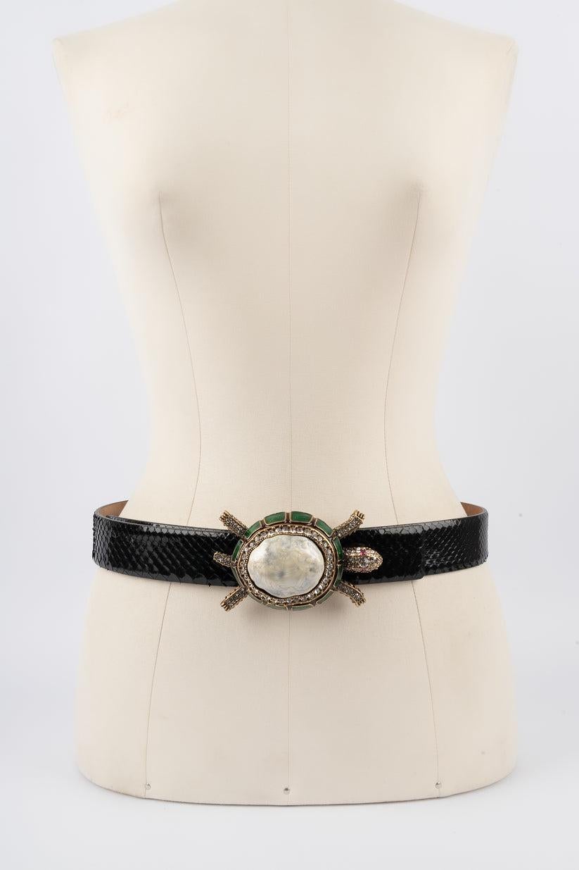 Valentino - Exotic leather belt decorated with an impressive golden metal buckle representing a turtle ornamented with enamel and rhinestones.

Additional information:
Condition: Very good condition
Dimensions: Length: from 75 cm to 85 cm

Seller