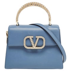 Valentino Hellblaue Ledertasche mit Juwelenverzierung VSling Top Handle Bag