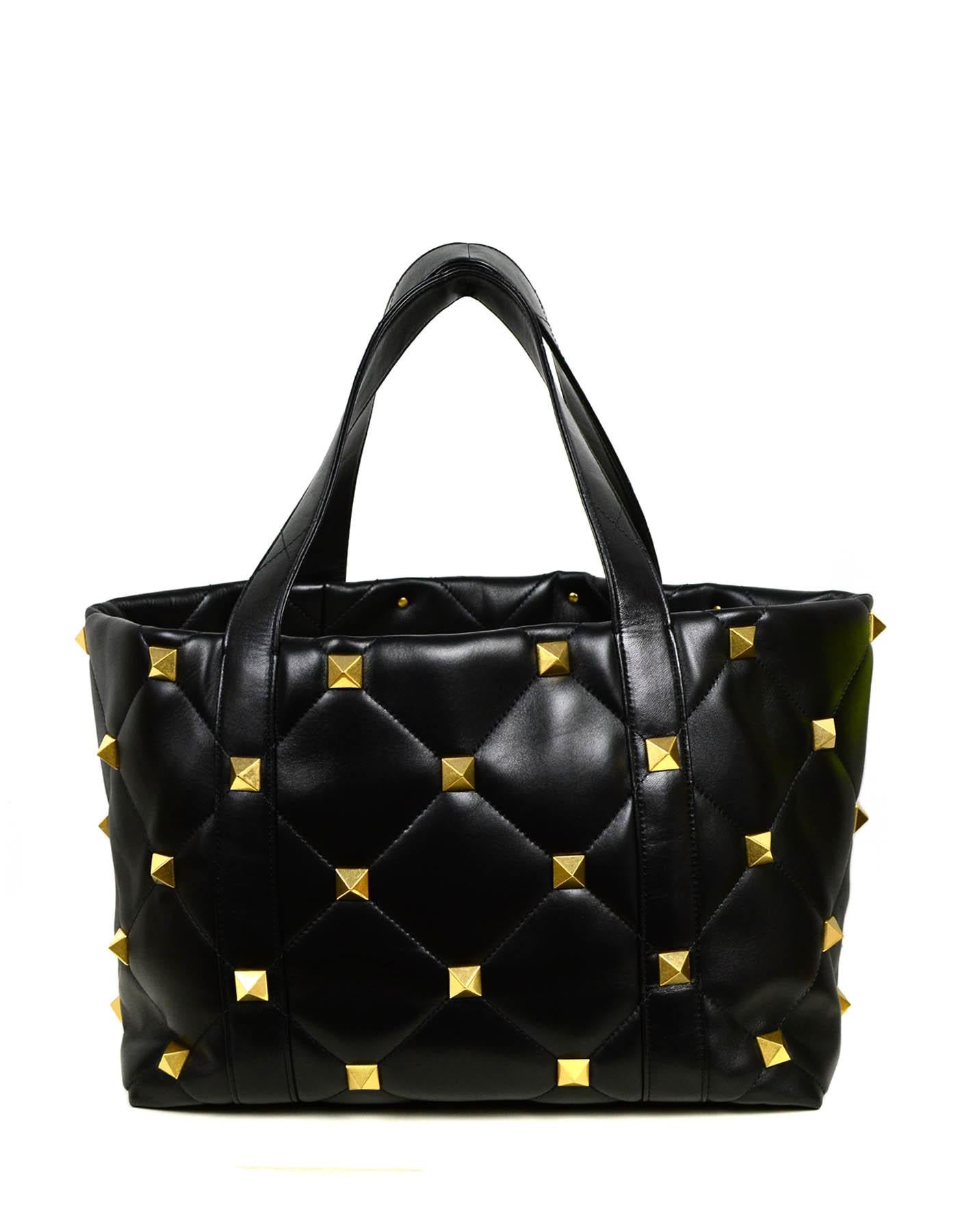 black leather tote bag with studs