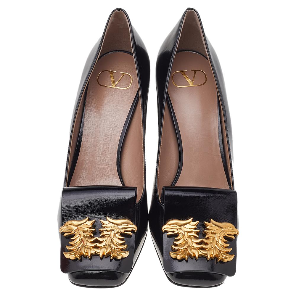 Add the right slant of style with these Valentino pumps. The designer pumps in leather feature Gryphons accent over the covered toes and block heels for a comfortable lift.

Includes: Original Packaging