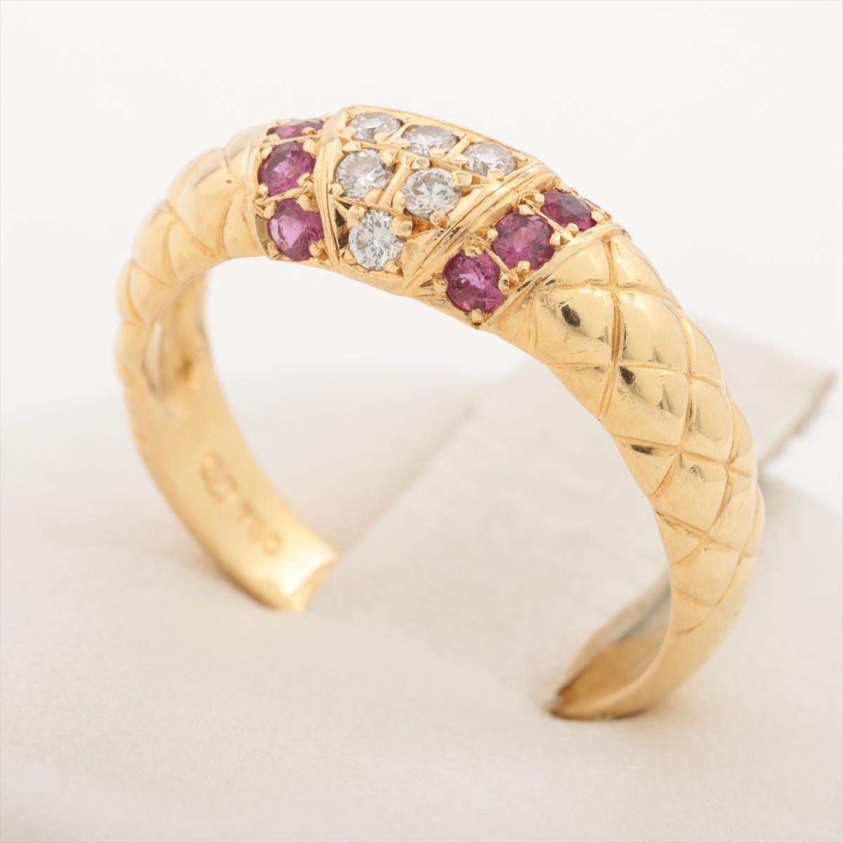 The Valentino Matelassé Diamond Ruby Ring in yellow gold is a luxurious and captivating piece of jewelry. Crafted from radiant yellow gold, the ring features a quilted matelassé pattern, adorned with sparkling diamonds and rich rubies that create a