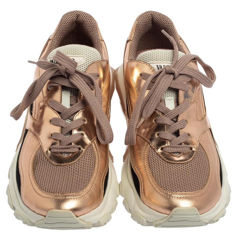 Incorporating a sporty vibe with a charming appeal that is truly luxe, these Bounce sneakers from Valentino are a must-buy! They are crafted from mesh and leather and feature a chunky frame. They are styled in a metallic bronze hue with black trims