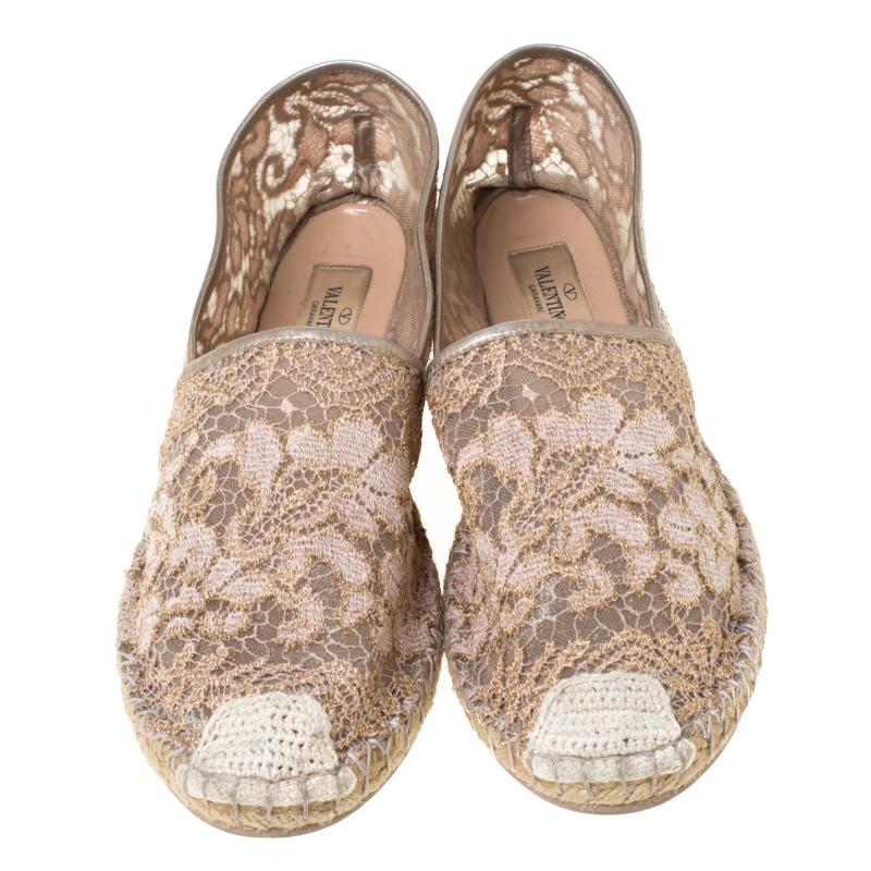 Step out in style this summer with these trendy espadrilles from Valentino. Featuring a pretty lace and mesh exterior, this round-toe pair is completed with braided jute details on the midsole and leather-lined interiors. They also feature cute