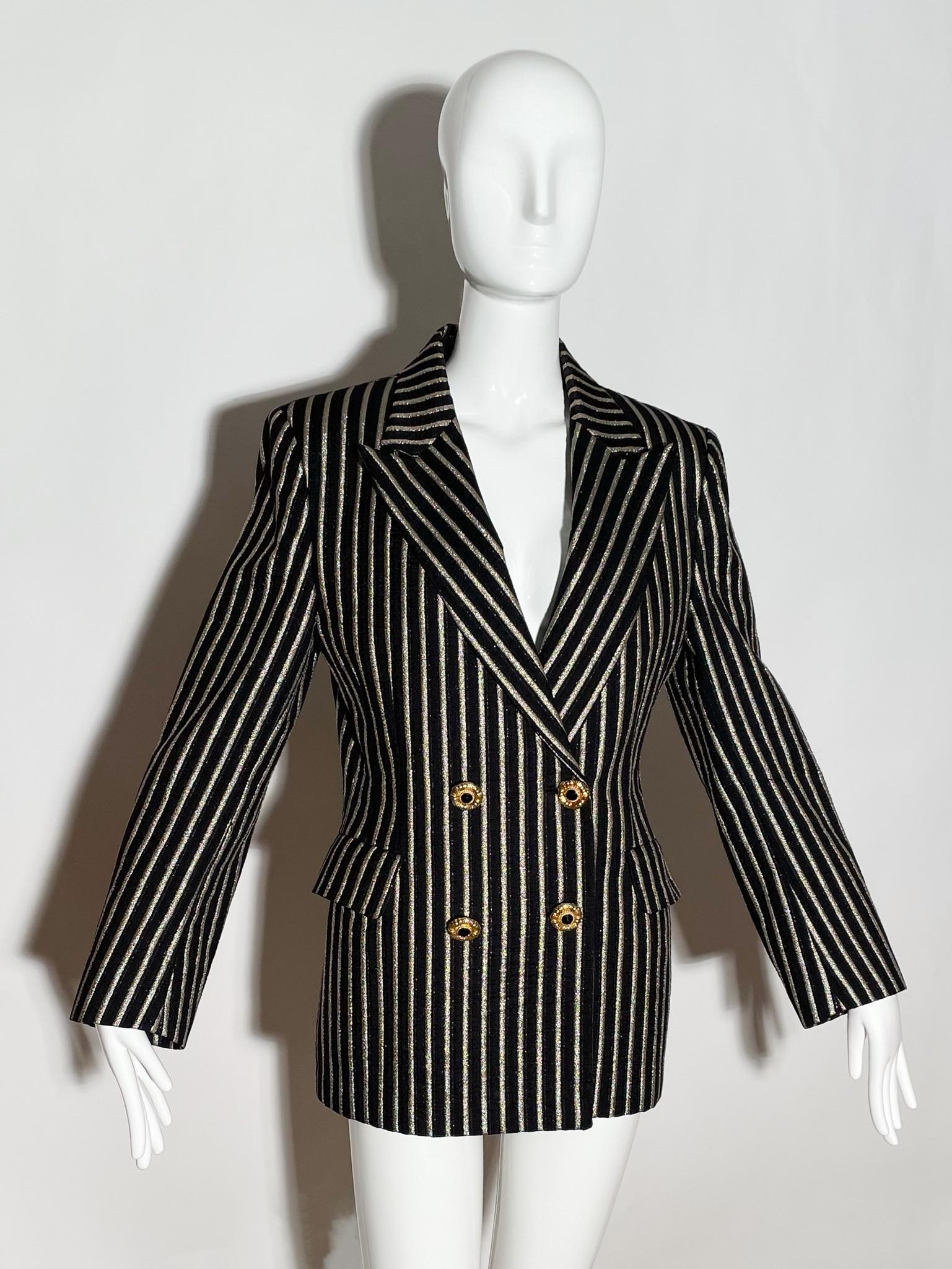 Black and metallic pin stripe blazer. Lapel. Front pockets. Gold Buttons. Made in Italy. 

*Condition: Excellent vintage condition. No visible Flaws.

Measurements Taken Laying Flat (inches)—
Shoulder to Shoulder: 16 in.
Sleeve Length: 23.5