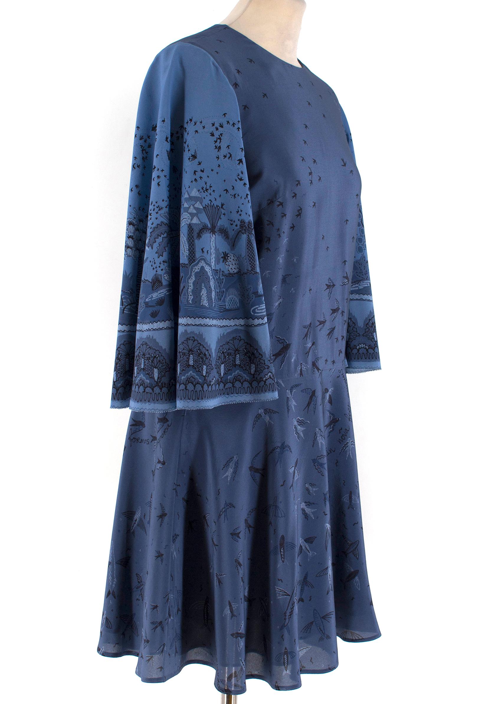 Valentino Metamorphosis Blue Crepe de Chine Mini Dress

-Blue mini dress with swallow print
-Silk crepe de Chine dress
-Bell sleeves
-Back zip closure

Please note, these items are pre-owned and may show signs of being stored even when unworn and