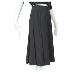 Valentino Falda midi minimalista de gabardina negra con remolinos - M, años 80
