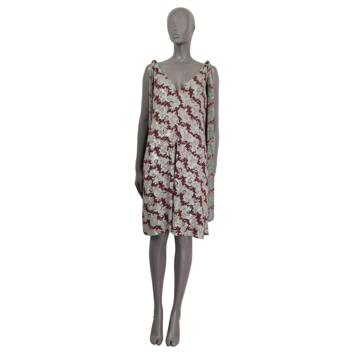 100% authentic Valentino sleeveless knee length dress in sage, burgundy and dusty rose sequins. Comes with a v-neck and sequin embellished bands on both shoulders. Opens with a concealed zipper and a hook on the side. Lined in silk (91%) and