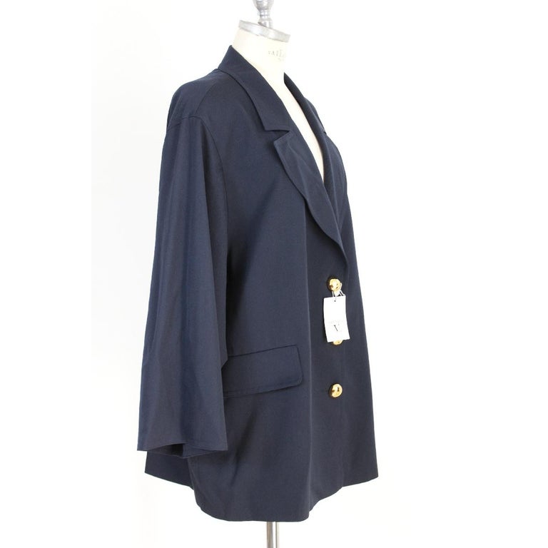 Valentino long women's vintage blue jacket with golden buttons. Made in Italy. New with label, size 44.

Size: 44 IT 10 US 12 UK

Shoulders: 46 cm
Bust / chest: 69 cm
Sleeves: 58 cm
Length: 86 cm