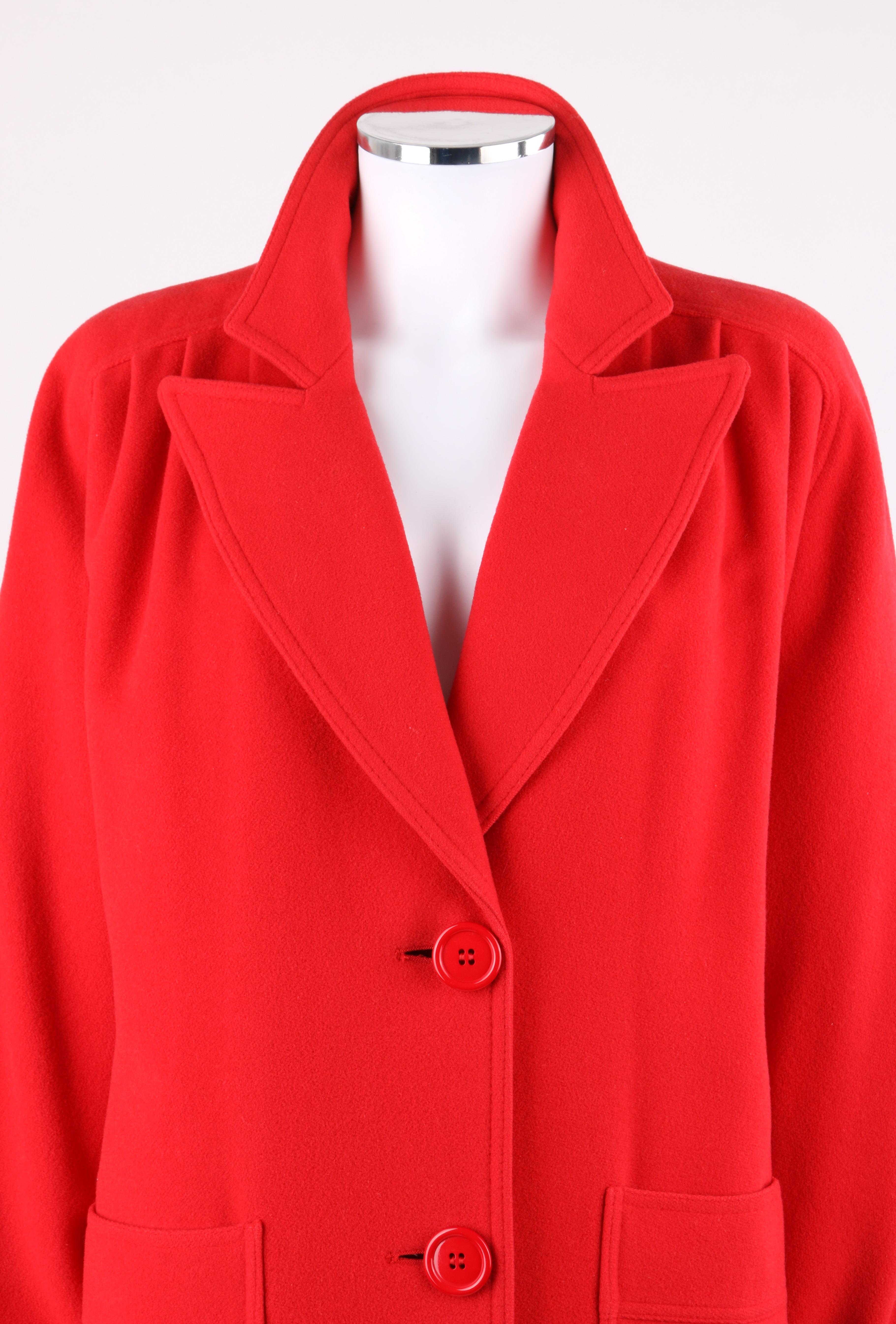 DESCRIPTION: VALENTINO Miss V c.1980's Peak Lapel Collar Oversized Cocoon Coat
 
Circa: c.1980’s
Label(s): Valentino Miss V; I.Magnin
Designer: Valentino Garavani
Style: Cocoon coat
Color(s): Red
Lined: Yes
Marked Fabric Content: Cloth: 100% Wool;