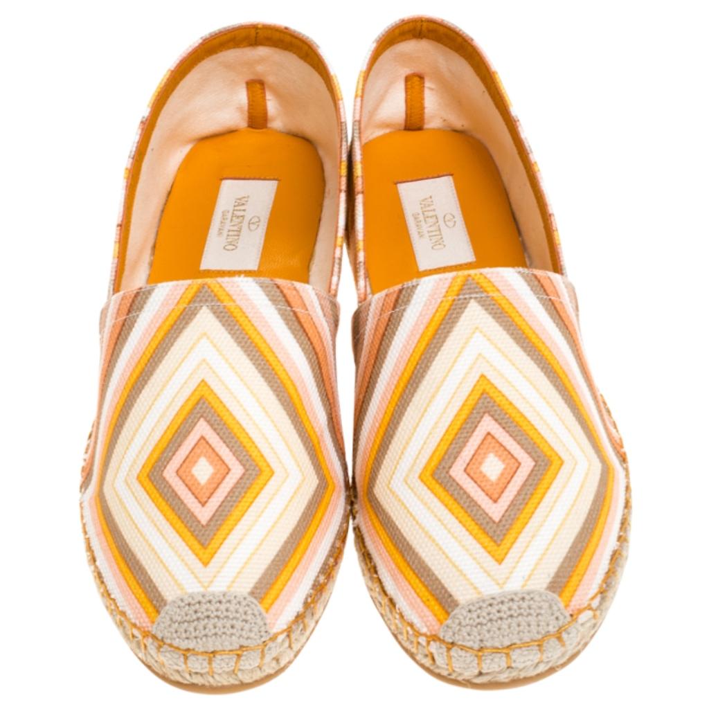 Step out in style with these trendy espadrilles from Valentino. Featuring a vibrant chevron print, this round-toe pair is complete with braided jute details on the midsole and cute knitted accents on the cap toe. Soak up the sun by slipping these on