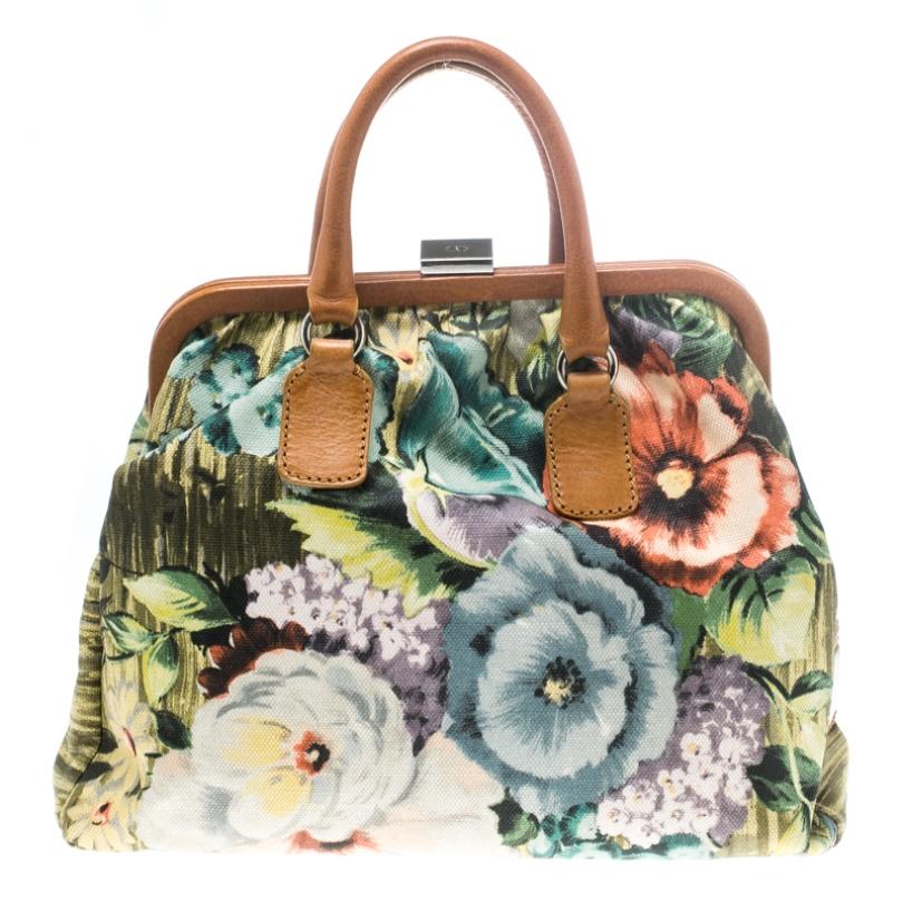 This Valentino satchel is one creation that is absolutely worth your buy. It has been crafted from canvas and features a lovely floral printed exterior. It has dual handles and the insides are perfectly sized to carry your necessities.

Includes: