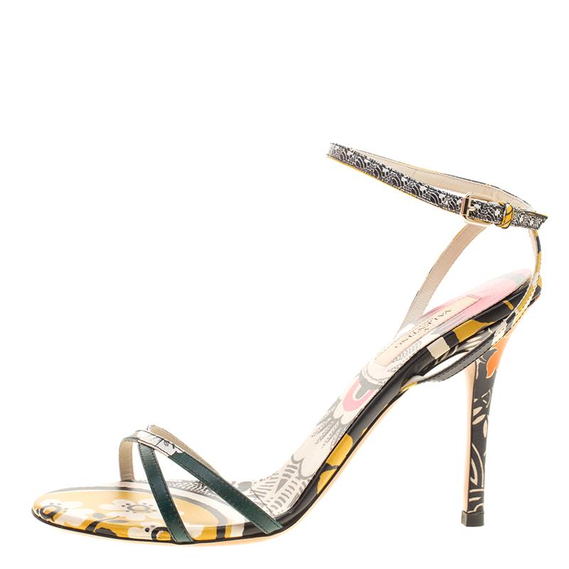 These Valentino sandals with that pleasing print and vibrant appeal make for the perfect switch for your everyday casual heels. Crafted and lined with leather, the multicolored floral print on the insoles is the chic detail that makes this pair such