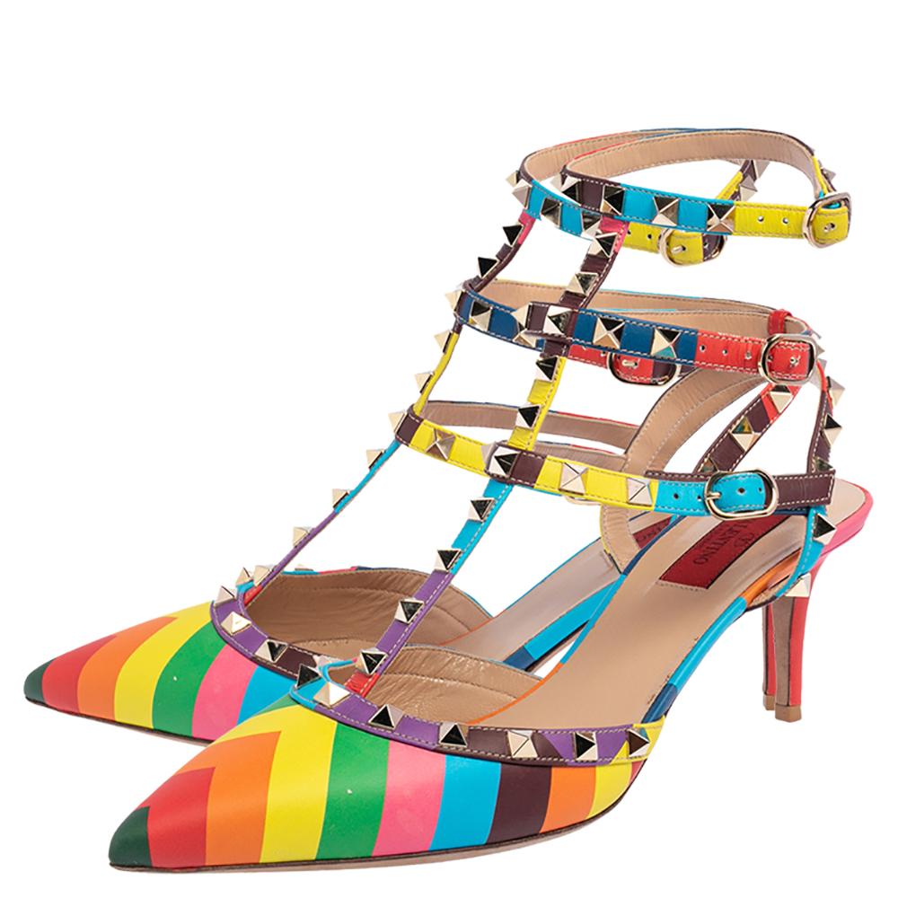When considering Valentino, three words come to mind: luxurious, bold, and iconic. These gorgeous Rockstud 1973 pumps are crafted from multicolored leather, and the sleek caged silhouette is adorned with carefully placed Rockstuds. They are complete