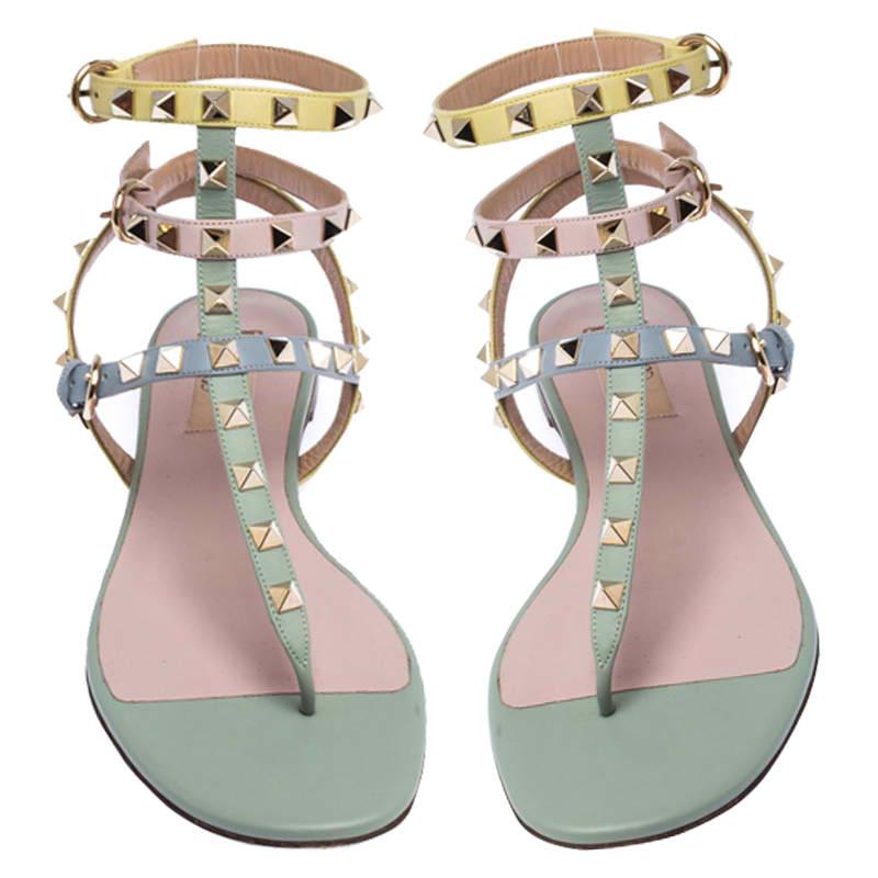 These sandals from Valentino are one of a kind. They are crafted from luxurious leather. The straps come in different pastel colors and are adorned with the brand's signature Rockstuds. This strappy pair is comfortable, stylish and extremely