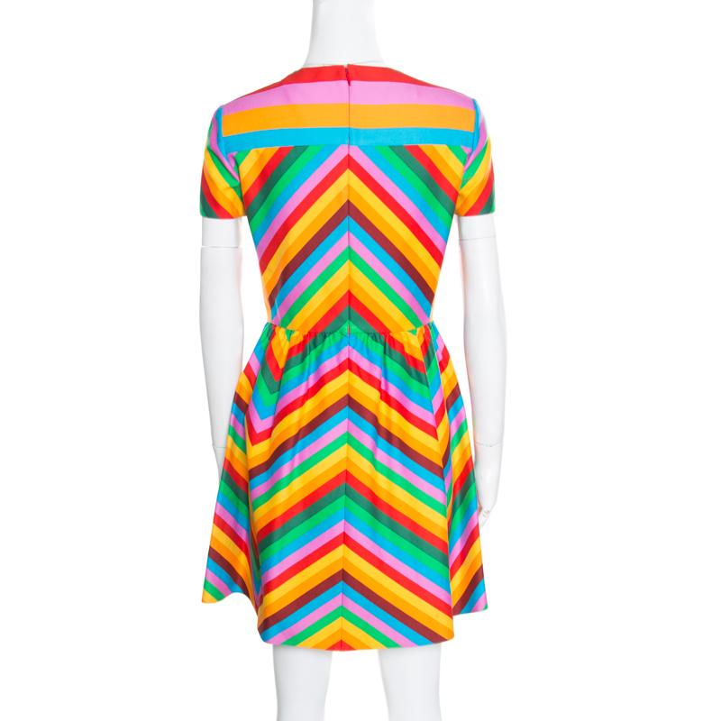 Feminine and stylish, this Bambolina dress is a must-have masterpiece in any fashionista's collection. Make a top style-statement with this elegant piece from the house of Valentino. This multicoloured outfit adorned with a rainbow chevron pattern