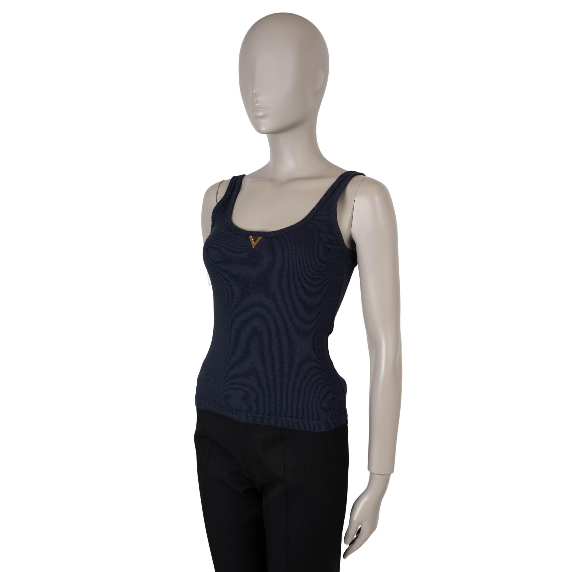 This 100% authentic Valentino tank top in navy blue rib-knit jersey cotton (with 3% elastane - please note the content and size tag are missing) blends modern elegance with everyday wearability. Featuring a scoop neck and back, it is highlighted by