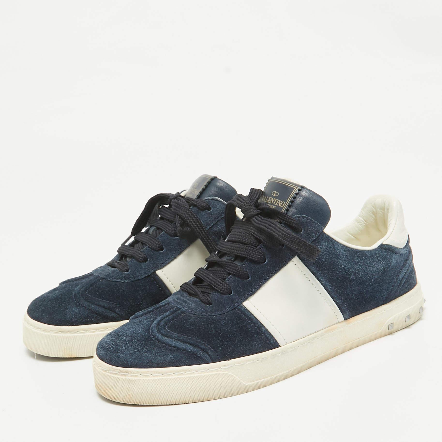 Coming in a classic silhouette these designer sneakers are a seamless combination of luxury comfort and style. These sneakers are finished with signature details and comfortable insoles.