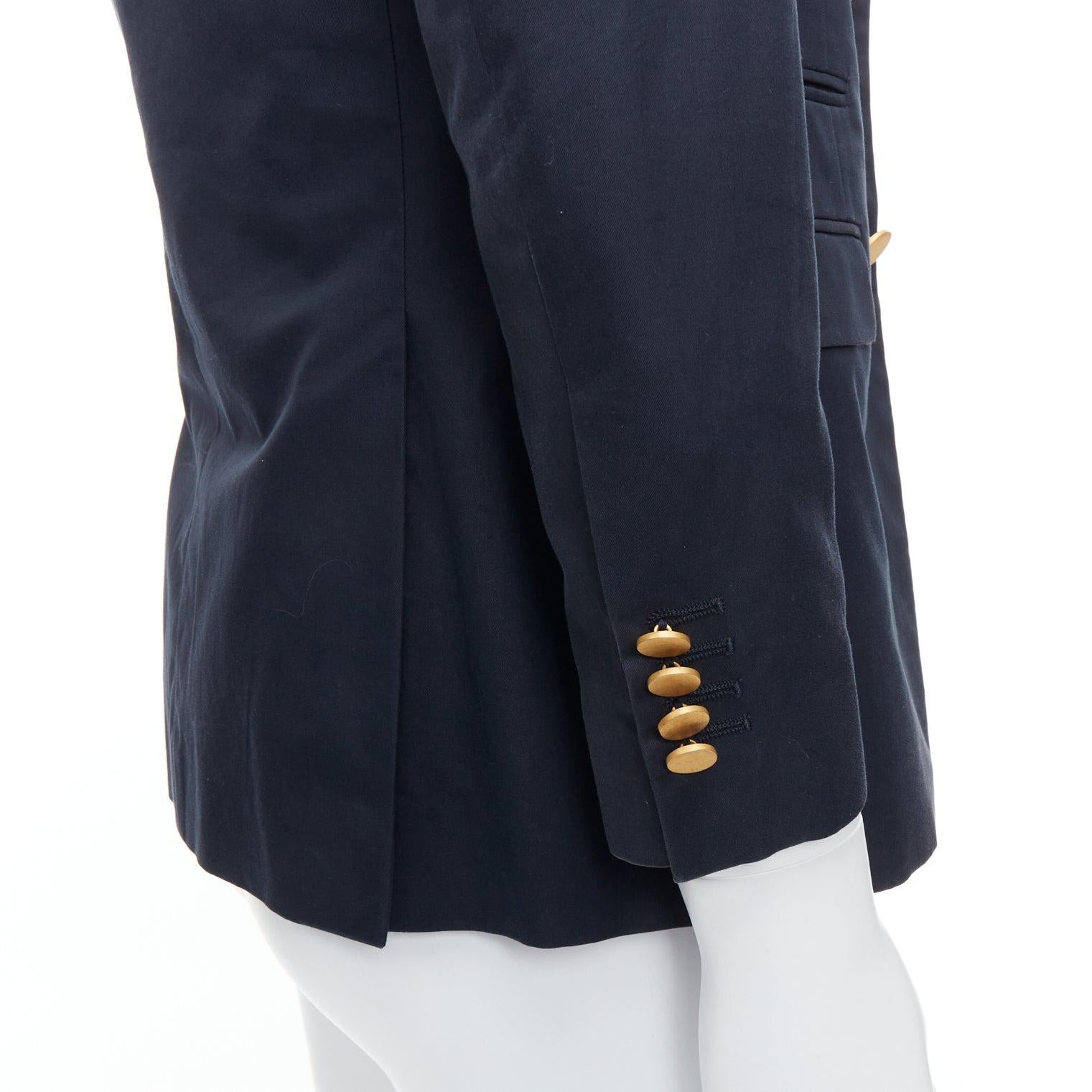 VALENTINO navy cotton red camoflage lined gold button blazer IT44 XS
Reference: CNLE/A00339
Brand: Valentino
Designer: Pier Paolo Piccioli
Material: Cotton
Color: Navy
Pattern: Solid
Closure: Button
Lining: Red Fabric
Extra Details: Red camouflage