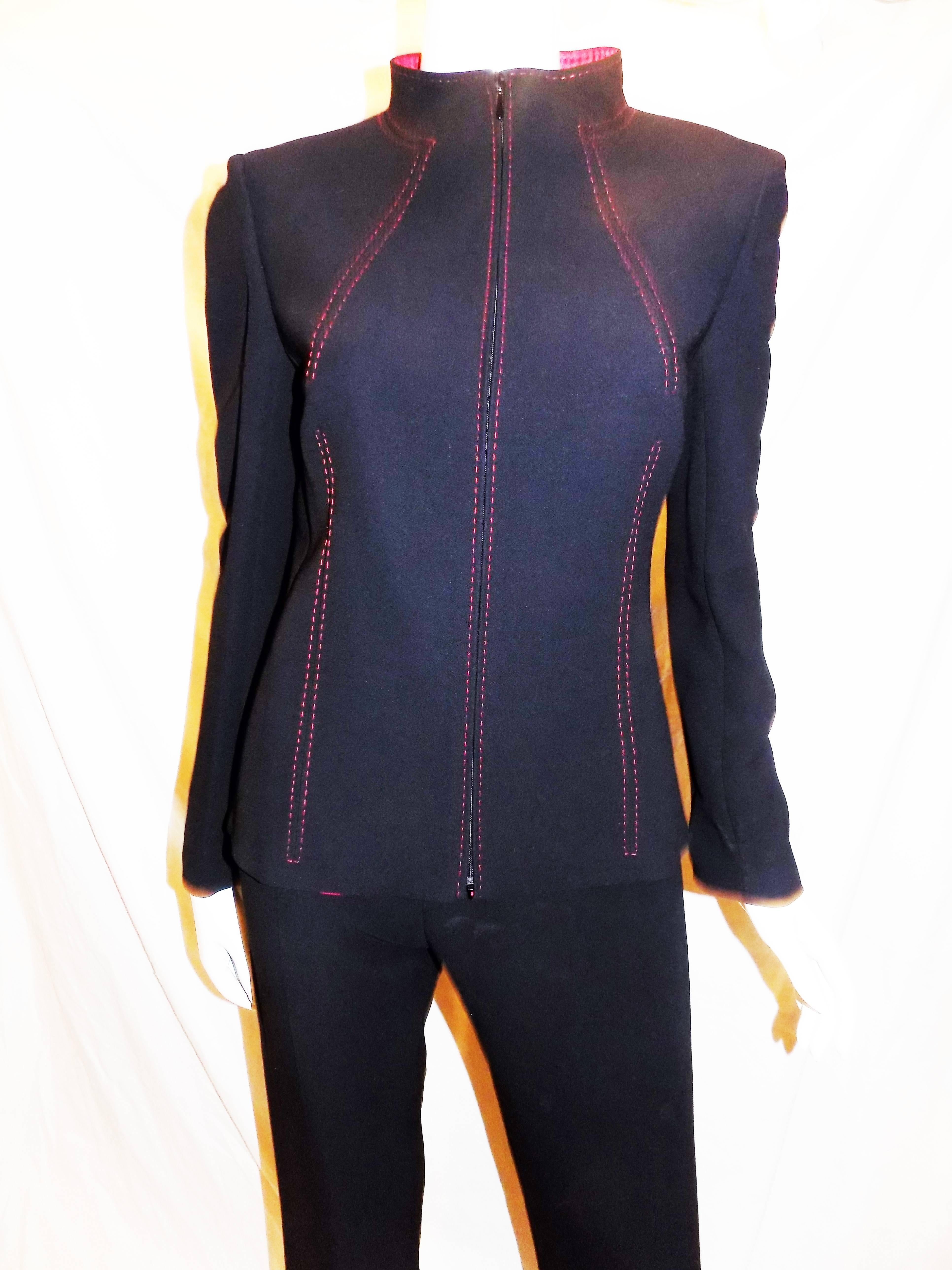 Beautiful light wool navy pant suit by Valentino. Featuring red silk lining, red top stitching and zipper front closure. Pants are not hemmed since it is new piece. Perfect spring - summer suit.  Marked size 8. Measurements are: Pants waist 28