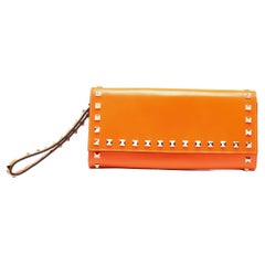 Valentino Neon Orange Leather Rockstud Trifold Wristlet Clutch