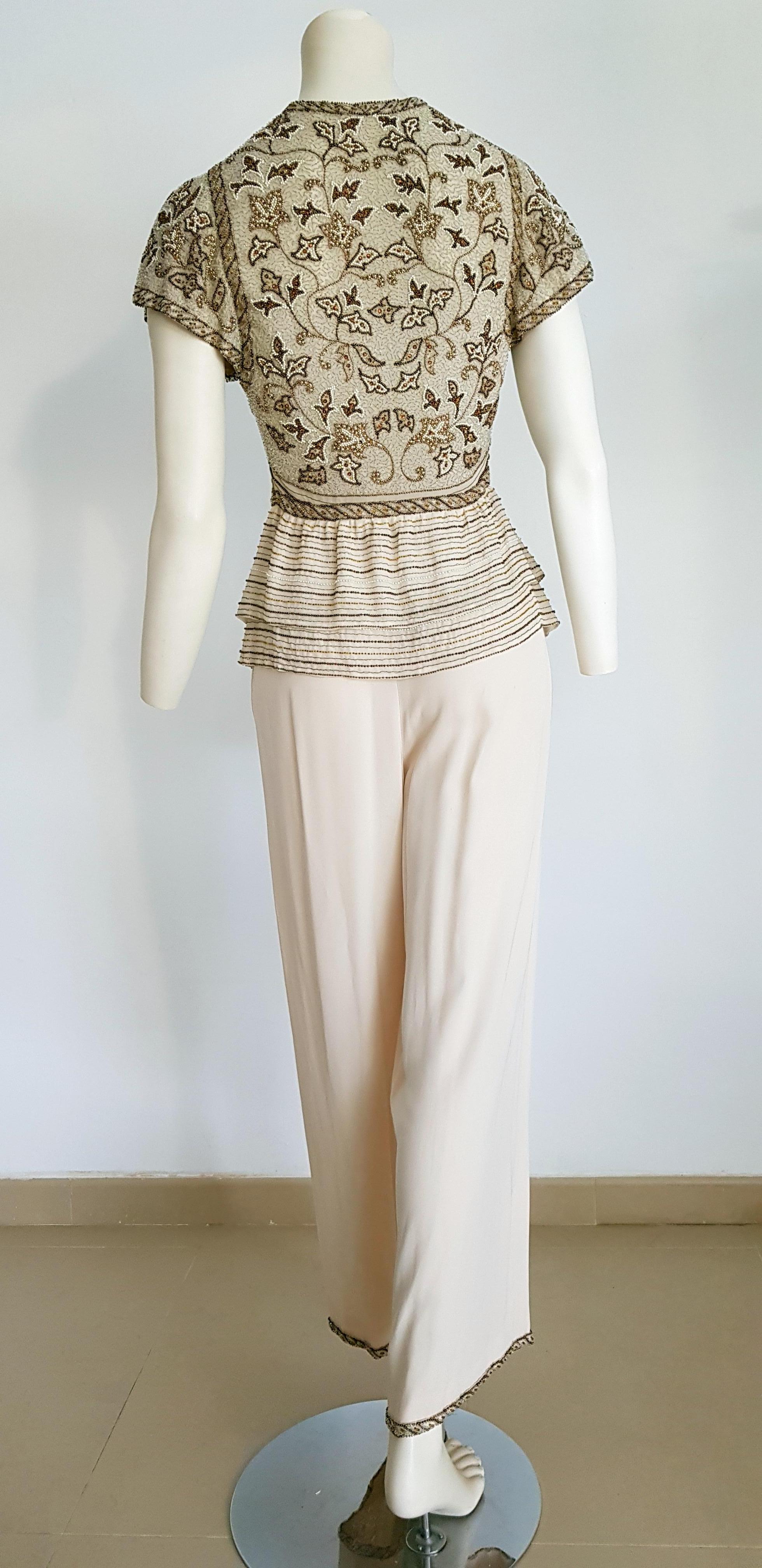 VALENTINO Haute Couture top and pants, silk and organza crepe, embroidered swarovski beaded beige dress - Unworn New

SIZE: equivalent to about Small / Medium, please review approx measurements as follows in cm. 
TOP: lenght 60, chest underarm to