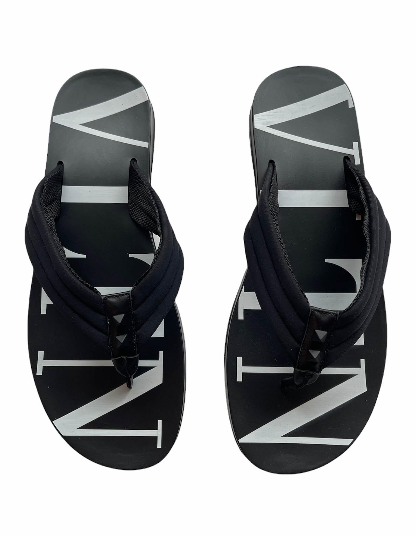 Valentino MEN'S Black/White VLTN Flip Flop Sandals sz 43

Made In: Italy
Year of Production: 2021
Color: Black and white
Closure/Opening: Slide on
Overall Condition: Like new
Estimated Retail: $375 plus tax


Marked Size: 43
Platform Height: .85