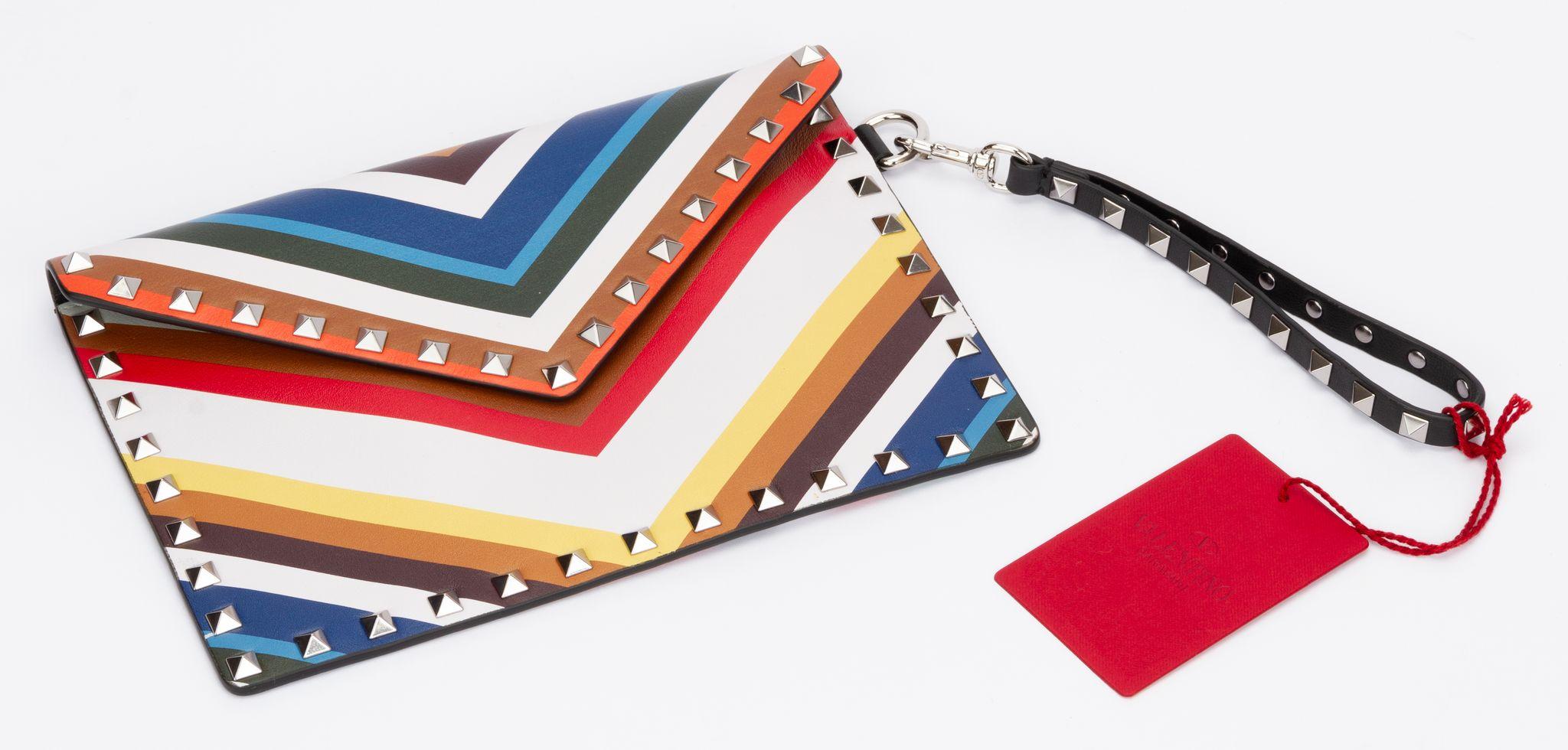 Valentino NIB striped rock stud clutch with detachable wristlet . Multicolor leather and silver tone hardware. Includes tag, original box and dust cover.