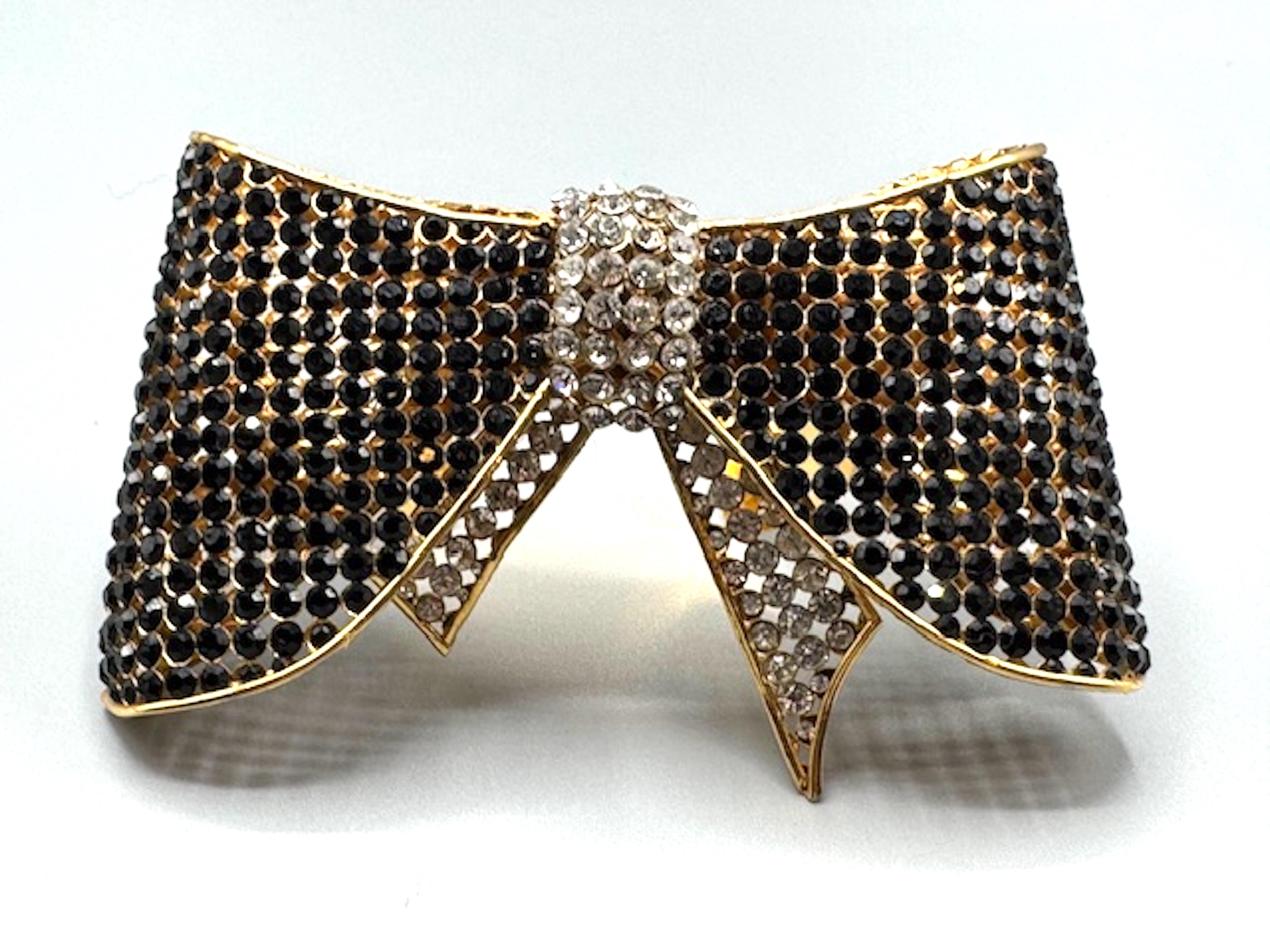 Donna Valentino Night 1980s Bracciale grande con fiocco in oro, nero e strass trasparenti