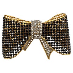 Valentino Night 1980s Bracciale grande con fiocco in oro, nero e strass trasparenti
