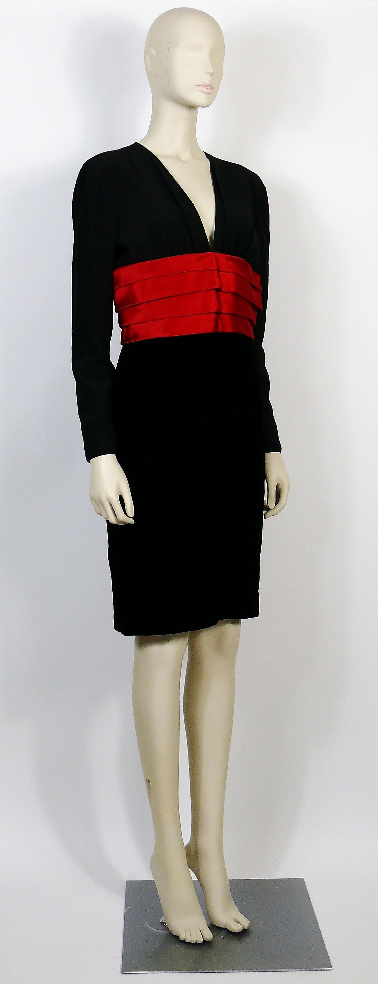 VALENTINO Night classic black and red cocktail dress.

This dress features :
- Black silk matte crepe upper bodice and sleeves.
- Deep V collar.
- Red satin cumberbund style middle boddice section.
- Black velvet skirt.
- Zipper closure on the bakc
