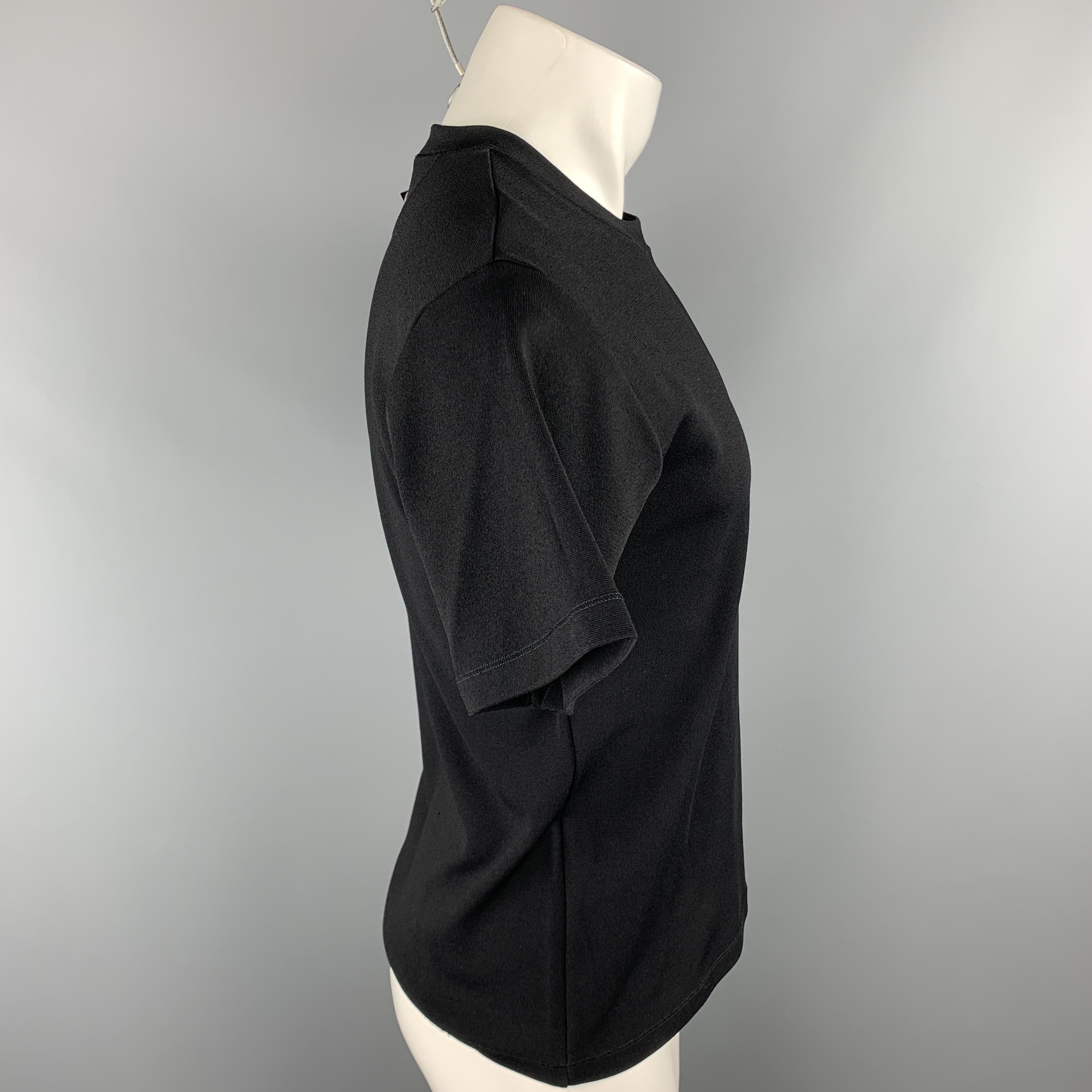 VALENTINO NOIR pullover comes in a black viscose blend featuring a back stud detail and a crew-neck. Made in Italy.

Excellent Pre-Owned Condition.
Marked: XS

Measurements:

Shoulder: 18 in.
Chest: 38 in. 
Sleeve: 9 in. 
Length: 24.5 in. 