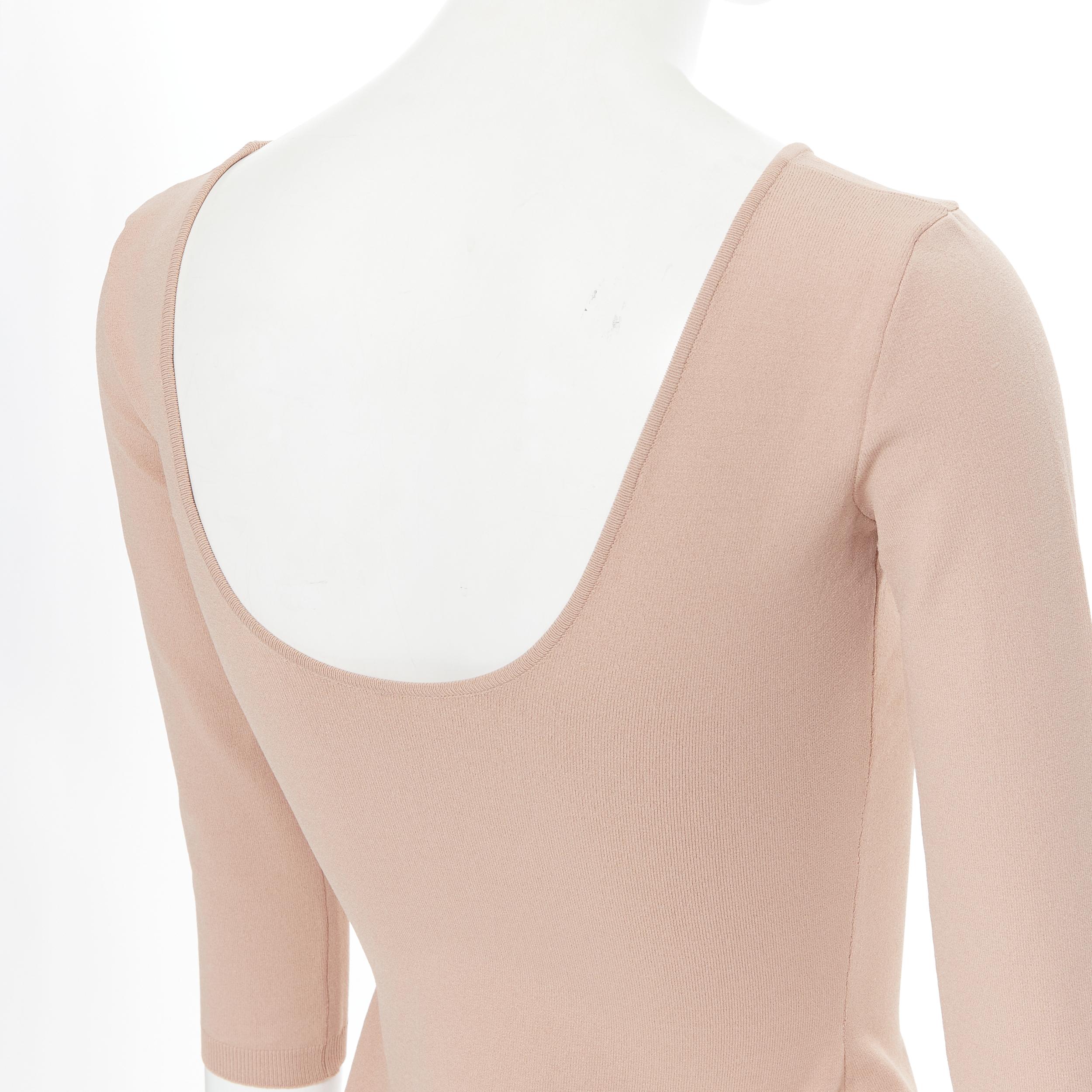 VALENTINO nude beige viscose knit U-neck 3/4 sleeve bodycon stretch top S 
Reference: LNKO/A01727 
Brand: Valentino 
Material: Viscose 
Color: Beige 
Pattern: Solid 
Extra Detail: U-Neck. 3/4 sleeves. 
Made in: Italy 

CONDITION: 
Condition: Very
