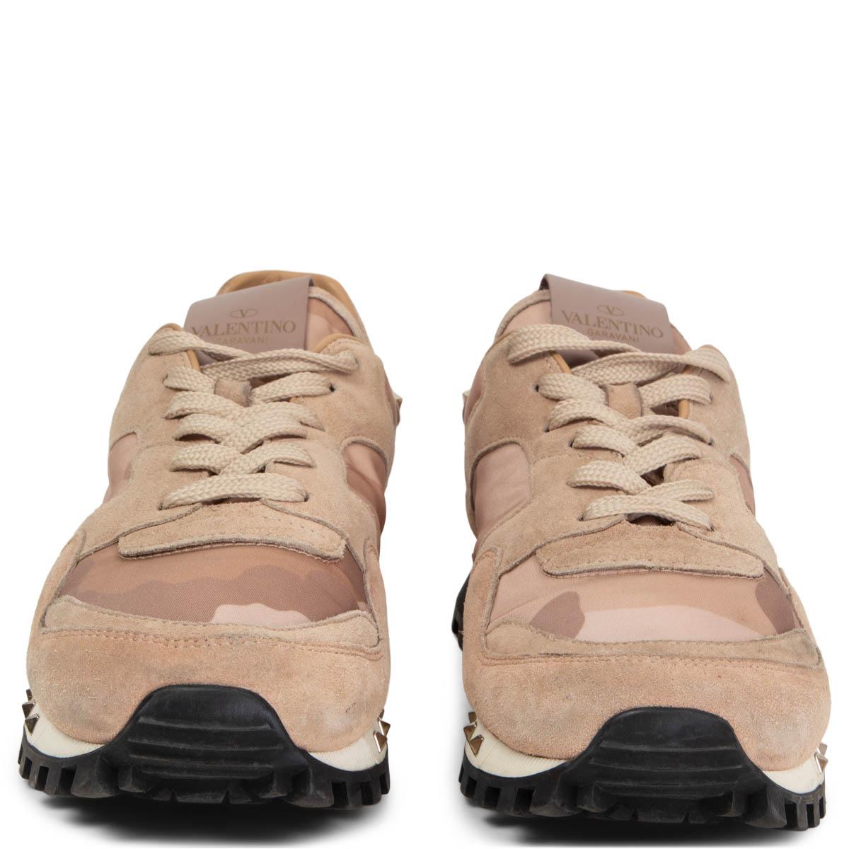 100% authentic Valentino Soul Rockstud sneakers in dusty rose nylon camouflage and suede leather featuring signature Rockstuds along the rubber sole and on the heel. Have been worn with some soft darkening to the front suede parts. Overall in