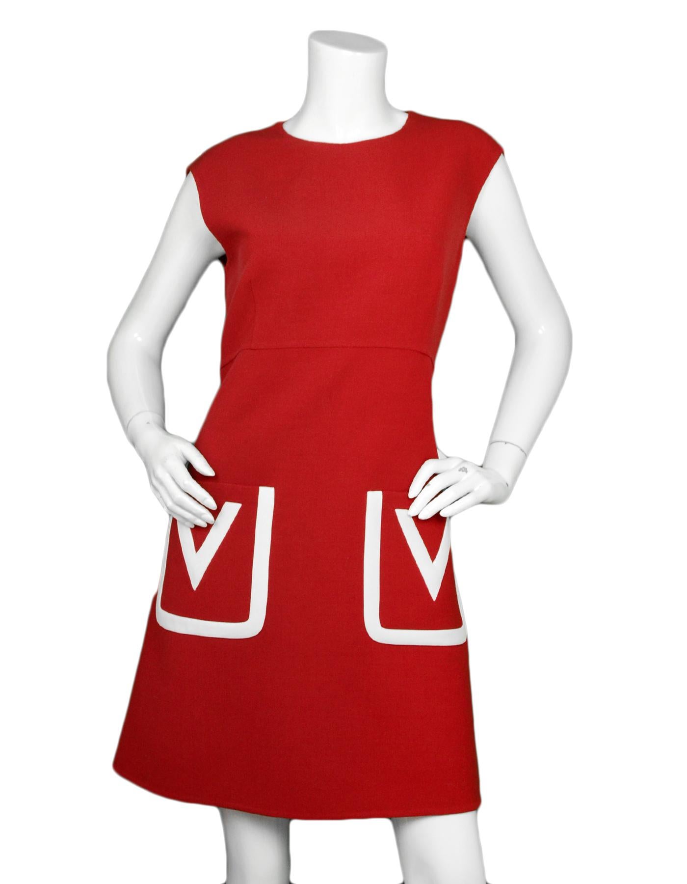 Valentino NWT Red Wool V Pocket A-Line Dress sz 12 rt $2,490

Made In: Italy
Color: Red
Materials: 100% virgin wool
Lining: 100% silk (pockets)
Opening/Closure: Back hidden zipper
Overall Condition:  New with tags
Estimated Retail: $2,490 +