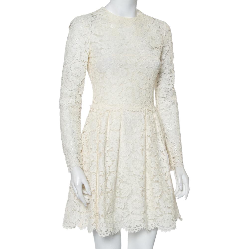 This mini dress from Valentino is tailored using off-white lace. It has an elegant silhouette and a back zipper to give you the desired look. It will look great with high heels as well as flats.

